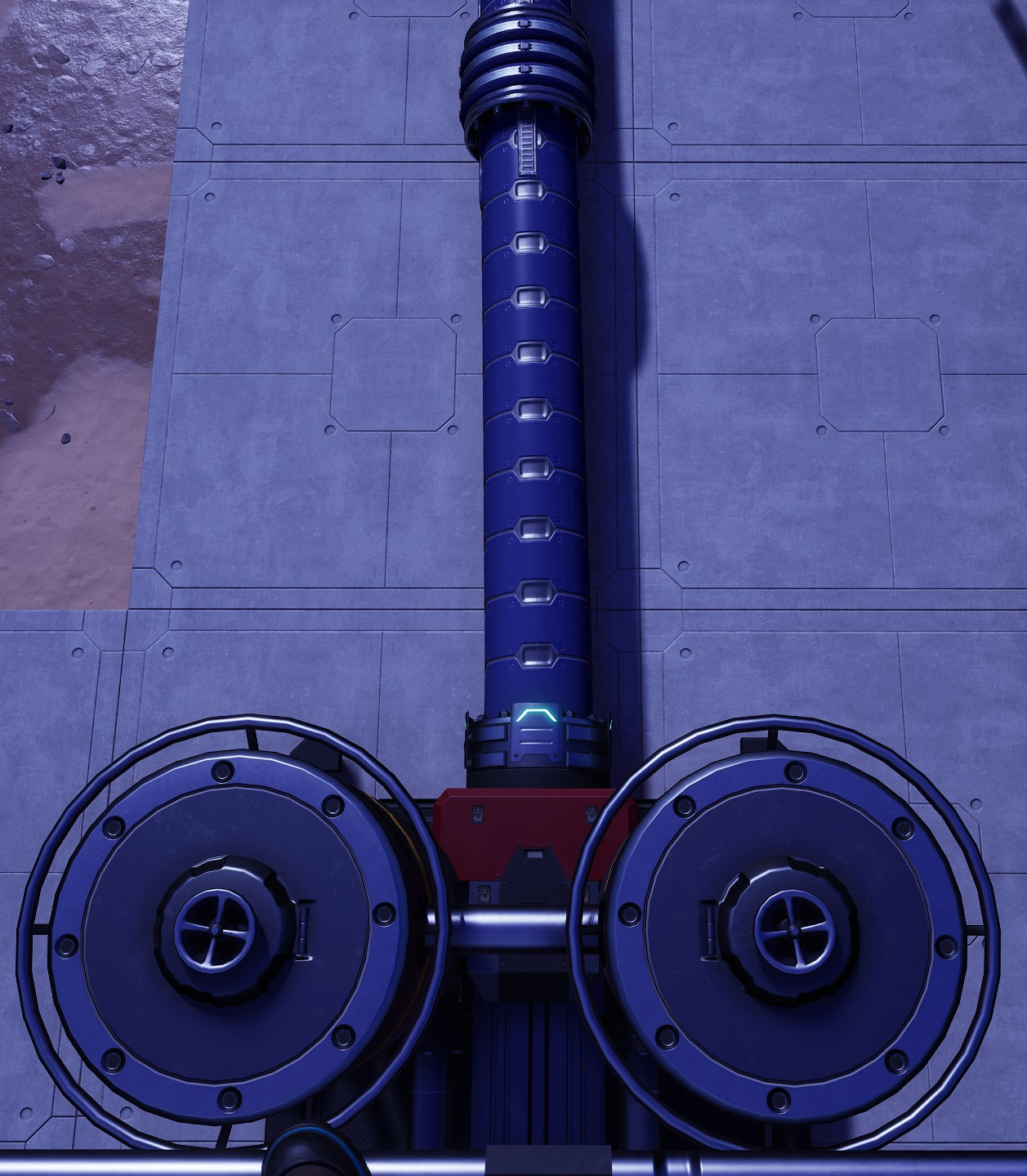 A top down view in the game Satisfactory showing an oil extractor with the pipe leading out of it. The shape of these items resembles the shape of a penis.