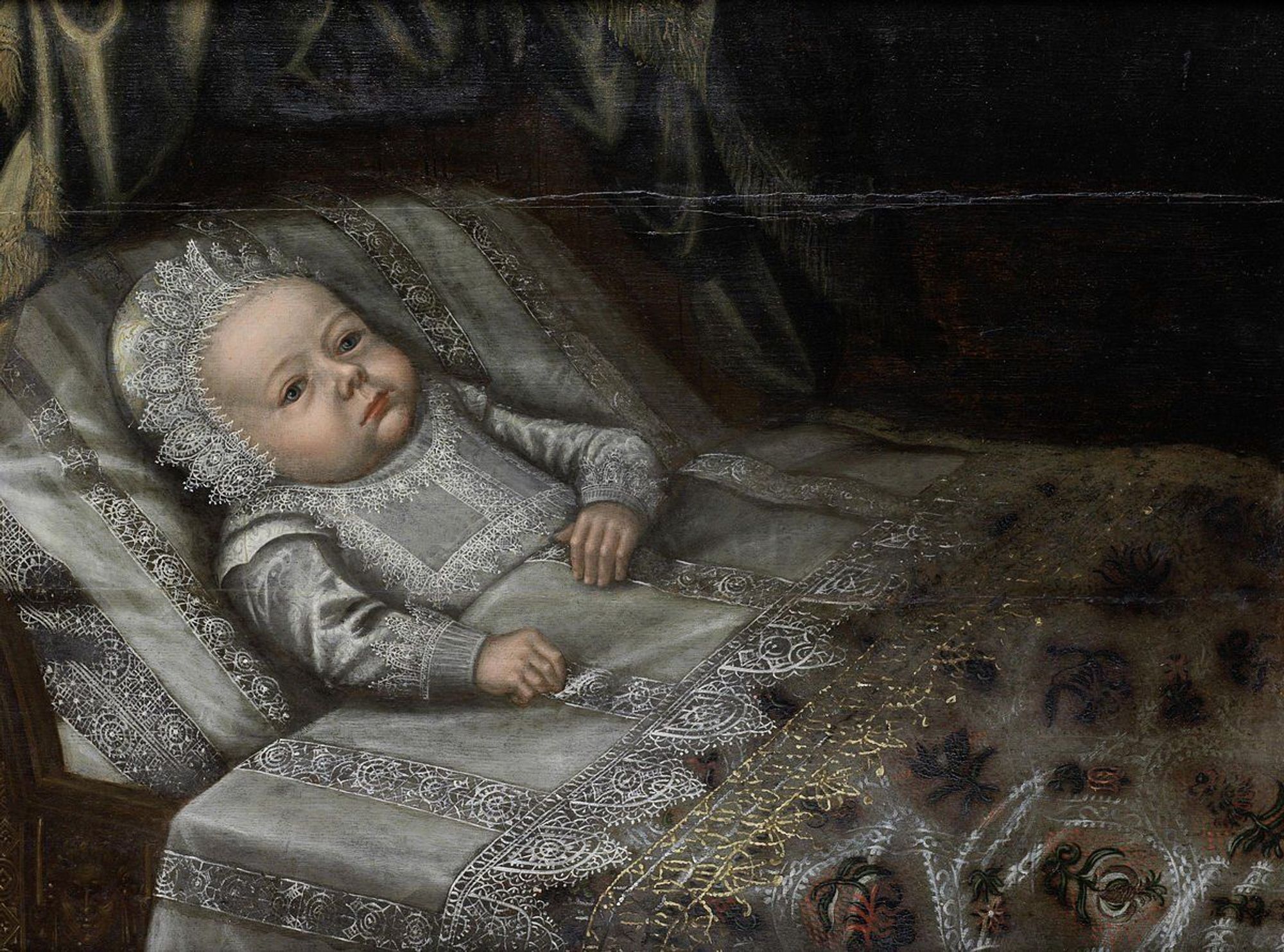 Oil portrait of a baby in a detailed lace gown and bonnet, lying in a richly decorated bed. 17th Century. Anglo Dutch School. 