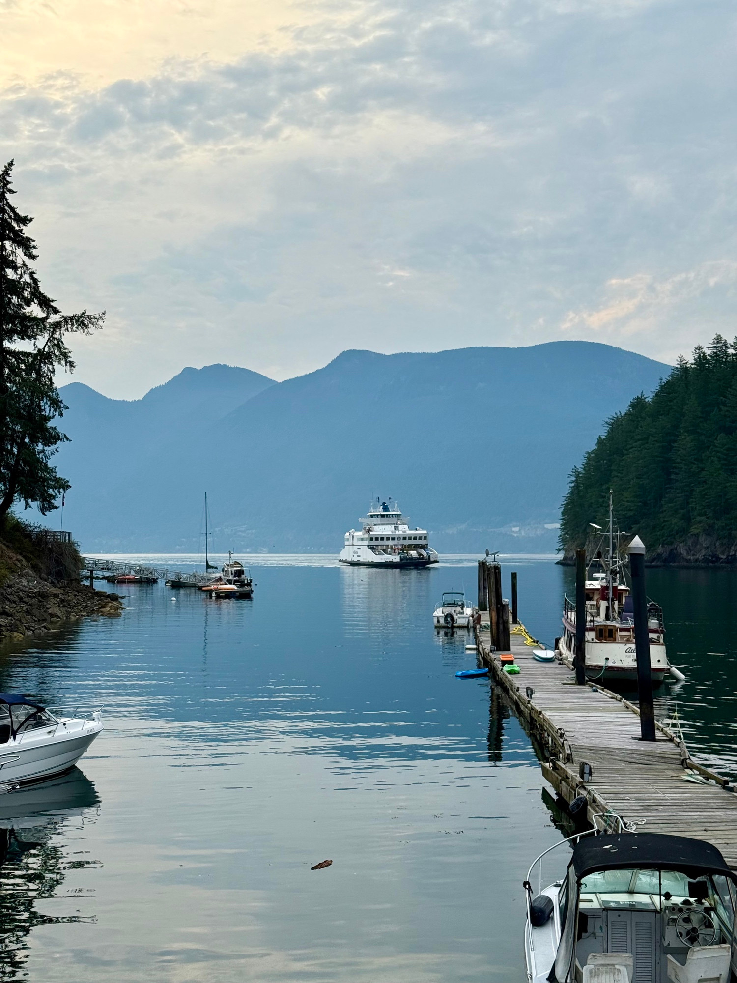 Ferry coming in to Snug Cove, Bowen Island Marina in the foreground. 