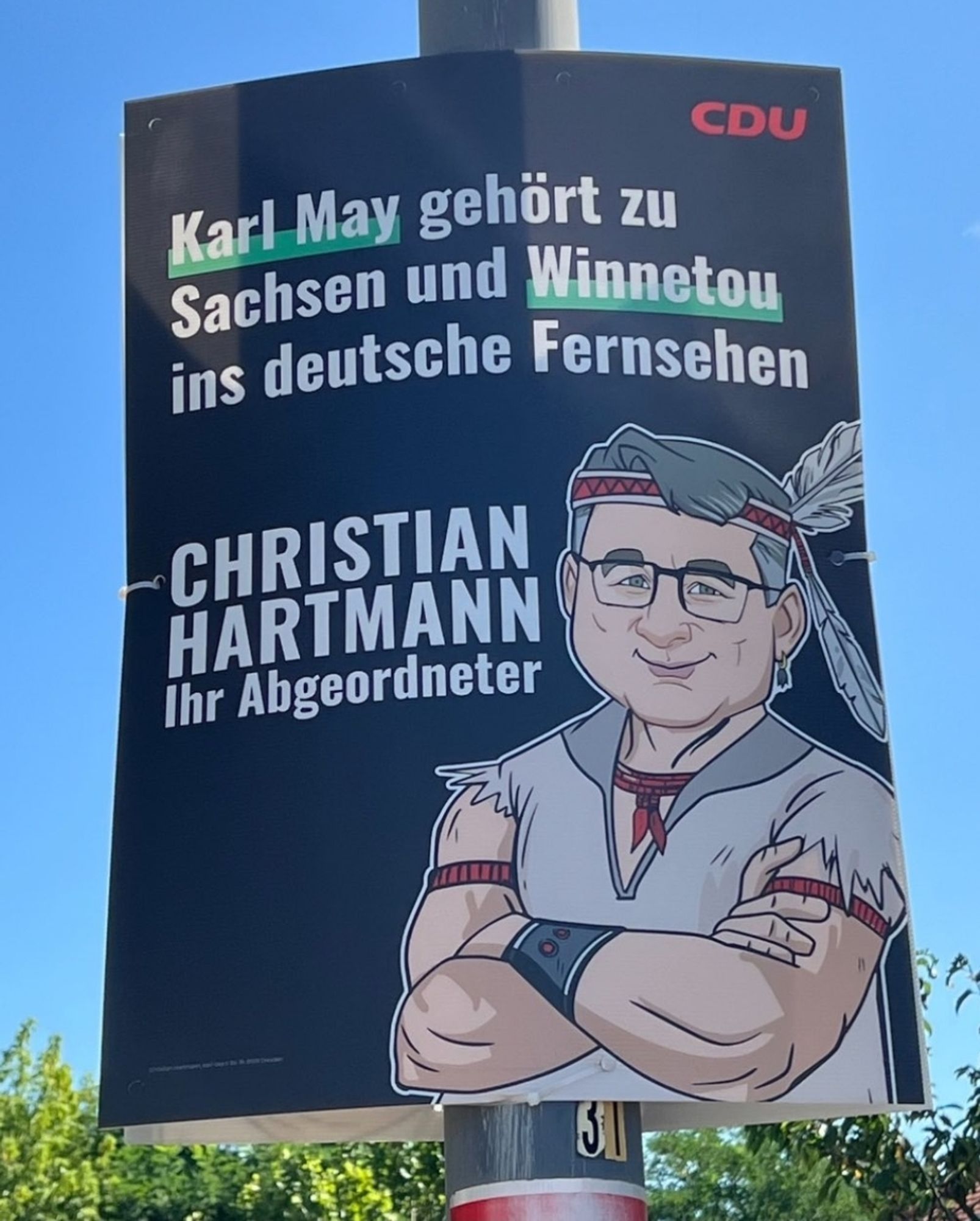 CDU Wahplakat in Sachsen
Karl May gehört zu Sachsen und Winnetou ins deutsche Fernsehen
 CHRISTIAN HARTMANN Ihr Abgeordneter
Darunter eine Zeichnung von Christian Hartmann als Winnetou