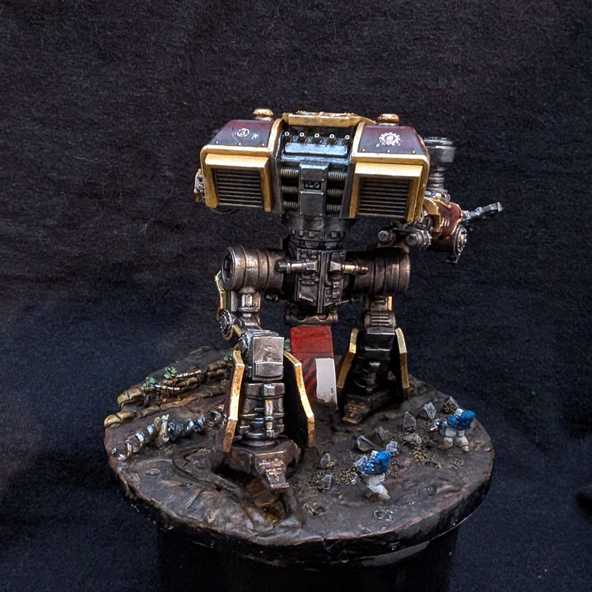 a Warhound Titan from Legions Imperialis, painted in Legio Audax (Ember Wolves) colours. rear view.