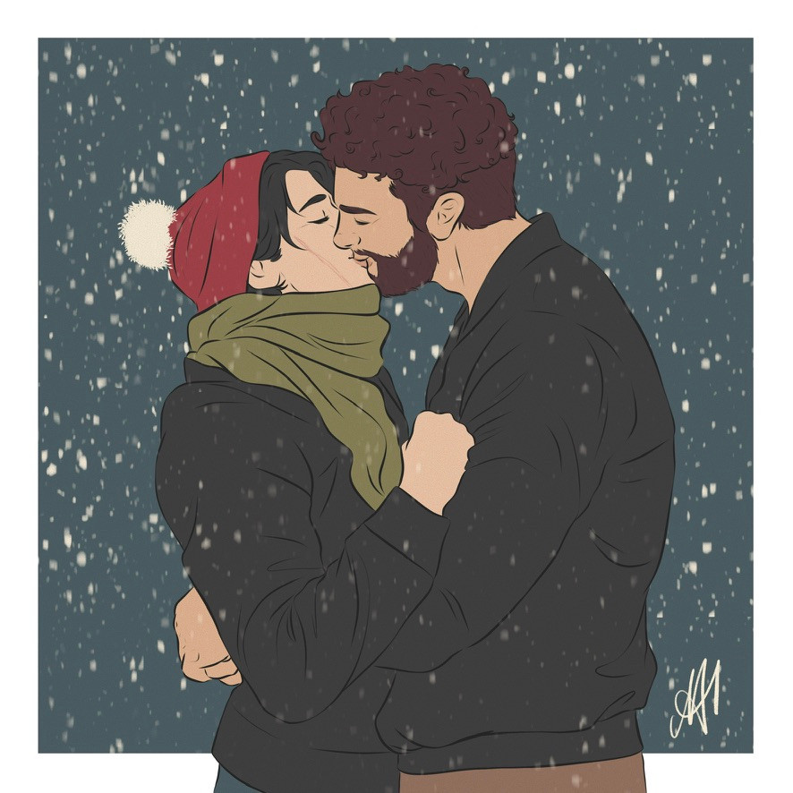 Winter themed image of two men kissing. The one on the left is pale with black hair and is wearing a red beanie and large green scarf. The one on the right has curly brown hair and a beard. 