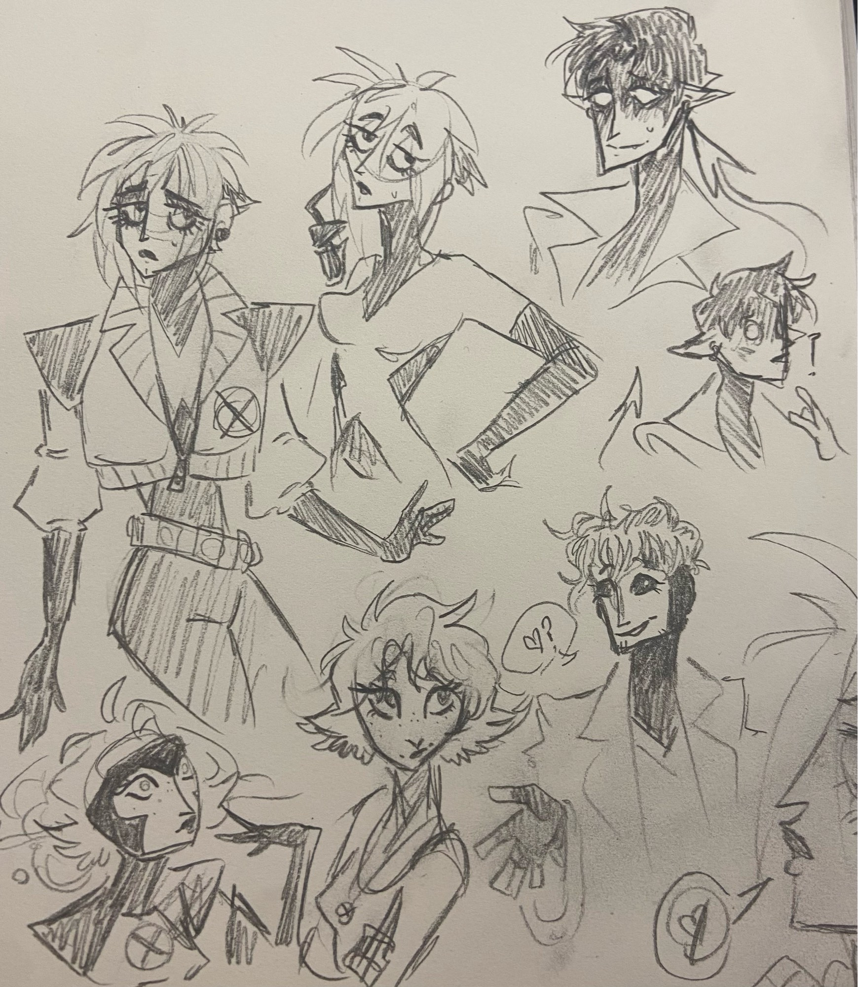 Scattered sketches featuring designs of Rogue, along with some smaller doodles of Jean Grey, Gambit being flirty, and Nightcrawler