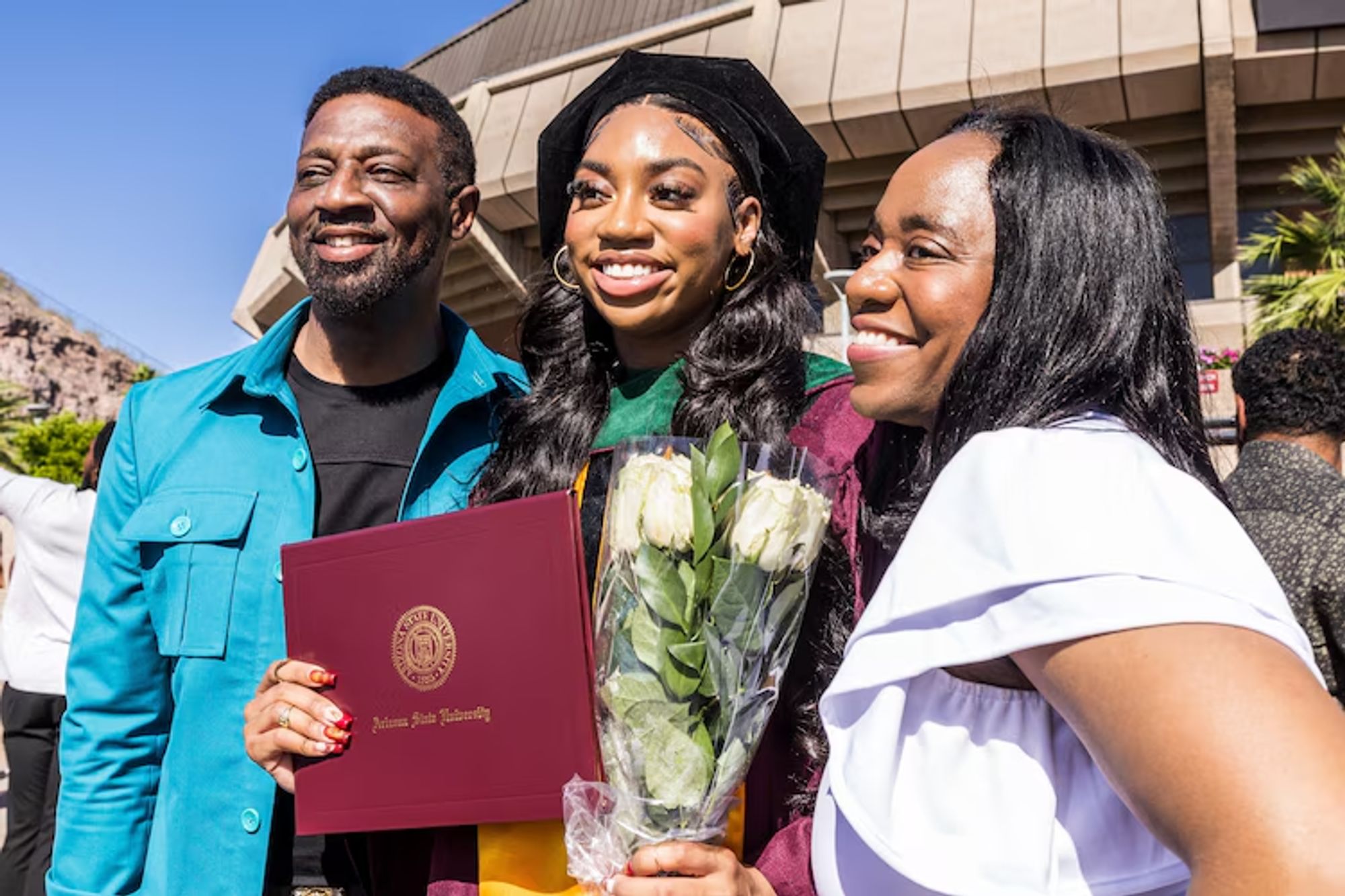 Dr. Dorothy Jean Tillman II and her family pose for a photograph after her graduation ceremony.