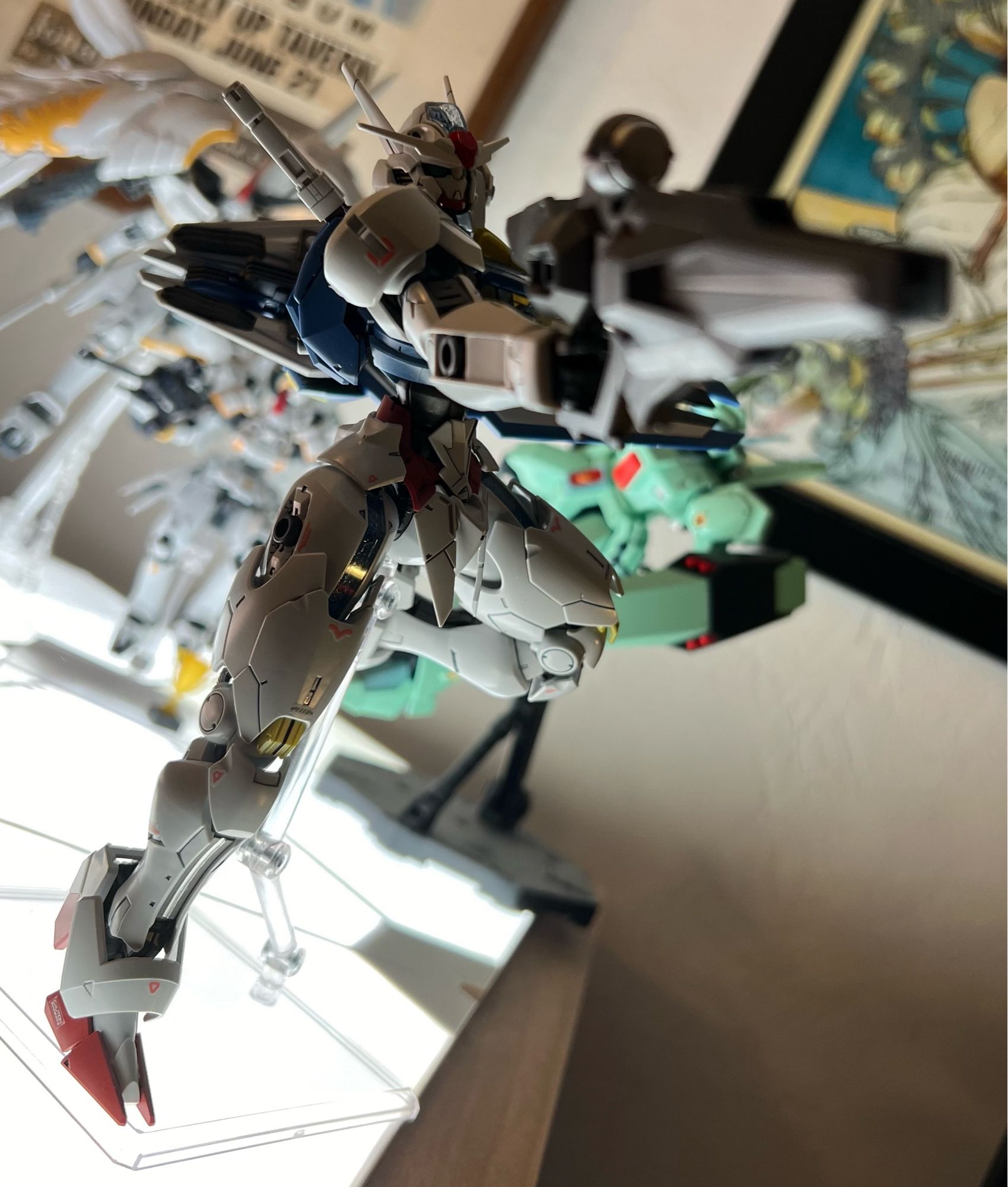 A gunpla model of Gundam Aerial in a shooting pose