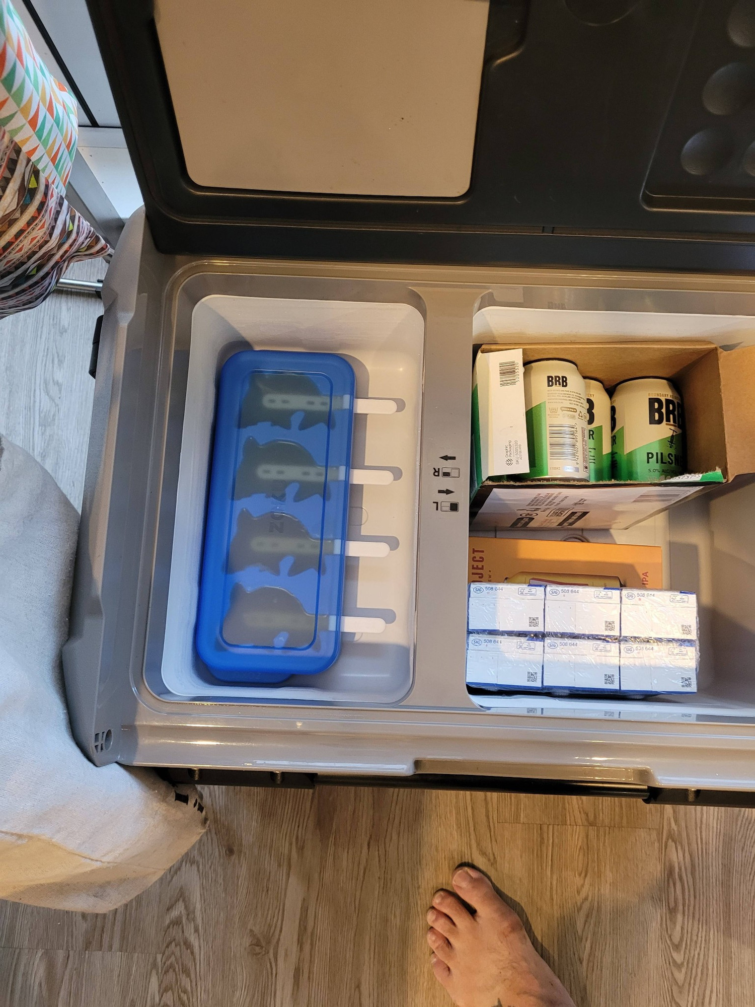 A loaded set of zoku shark ice pops fitting perfectly into a brass monkey 12v freezer compartment.