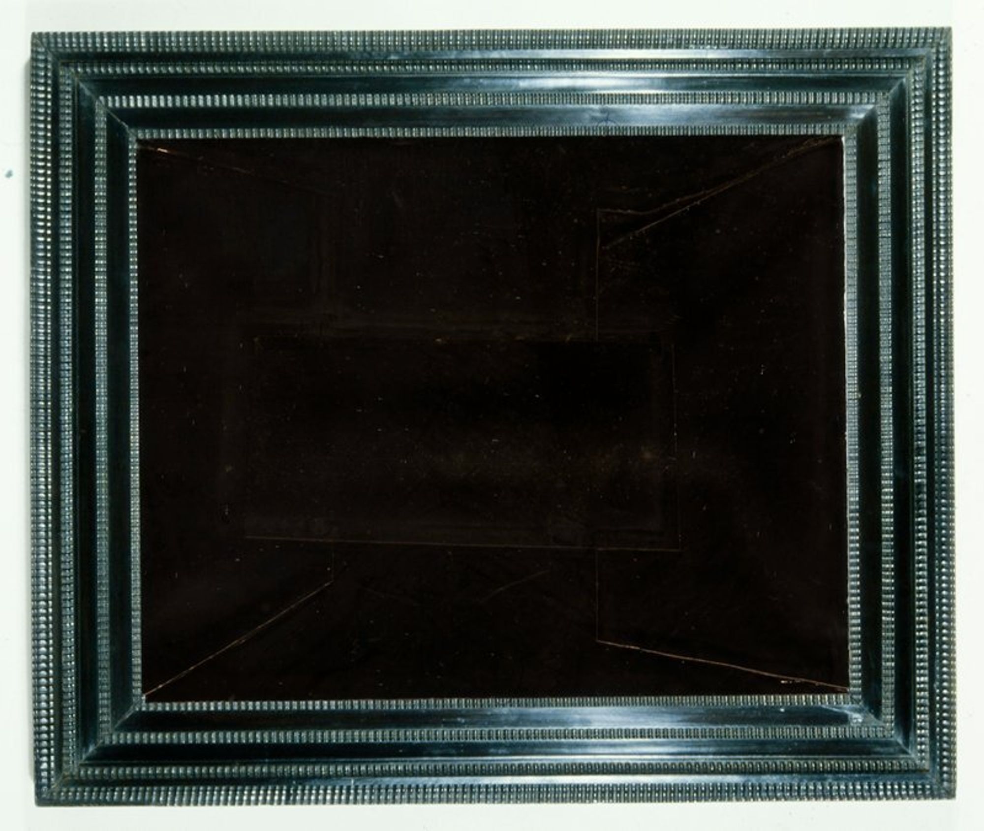 frame, cabinet type in Indian ebony with veneered ogee and flat panels divided by four bands of ripple moulding on laminated pine carcass; on Pieter Claesz, "Still Life," 45.10