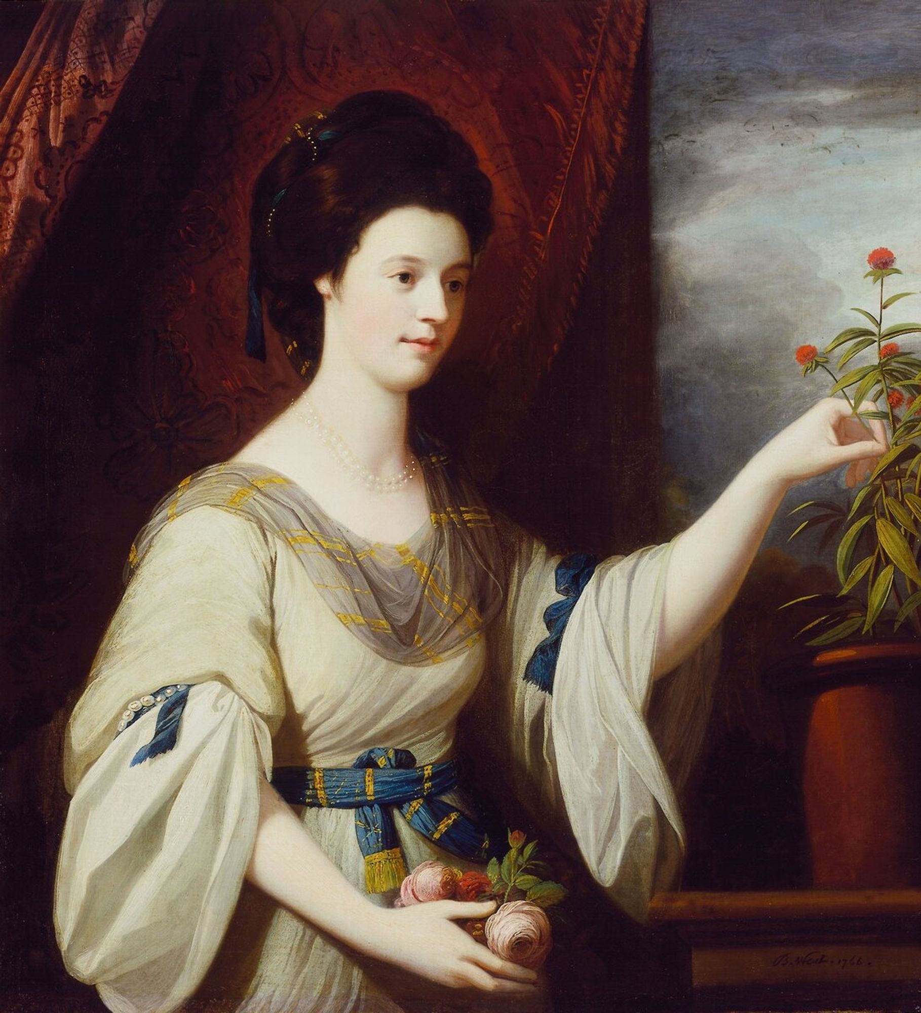 Portrait of Diana Mary Barker. Young woman turned three-quarters toward the spectator, with dark eyes straight ahead, raises left hand to pick a small pink flower growing in a pot; in the other, she holds some pink roses. Blue and gold striped ribbon, barely discernible, wound about dark hair. Fair complexion, aquiline nose. Greyish-tan dress, full elbow-length sleeves and undersleeves caught up with pearls and blue ribbon. Grey and gold striped scarf draped around neck; blue and gold striped belt with gold fringe. Double strand of pearls caught loosely about base of throat.
Benjamin West wanted to make a name for himself as a painter of grand historical pictures, but he first rose to international prominence as a portraitist. This painting, done three years after West settled in London, reveals the artist's debt to Sir Joshua Reynolds. The careful modeling, high degree of finish and smooth surface, and the elegant pose and setting reflect the neoclassical manner of Reynolds currently in vogue. The sitter, seventeen-year-old Lady Diana Mary Barker, resided at Speen House in Berkshire, England.