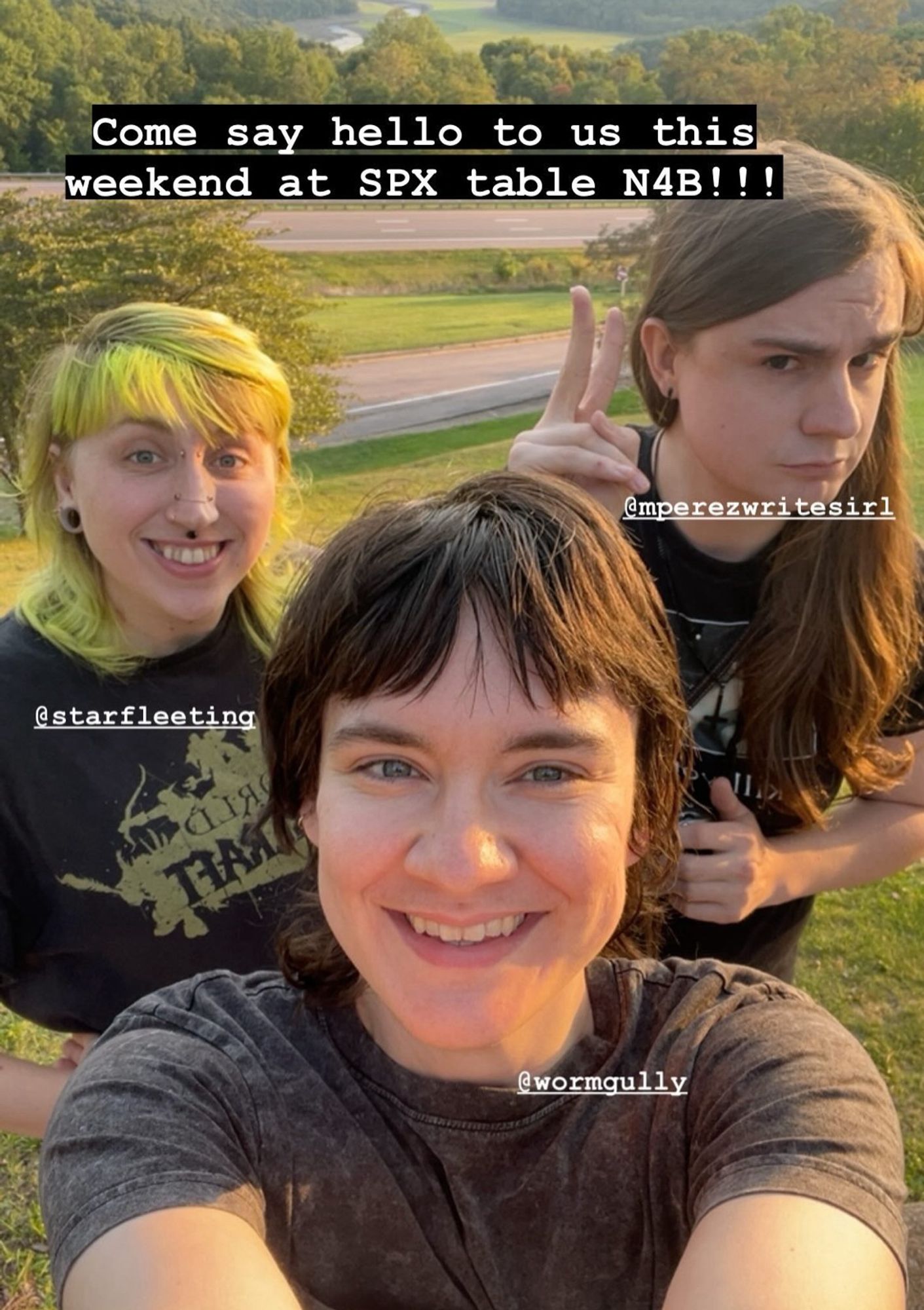 photo of Grey, Angel, and Robin smiling at the camera. The caption says “come say hello to us this weekend at SPX table N4B!!” also has each person’s ig tag, but you don’t care about that right? do you??