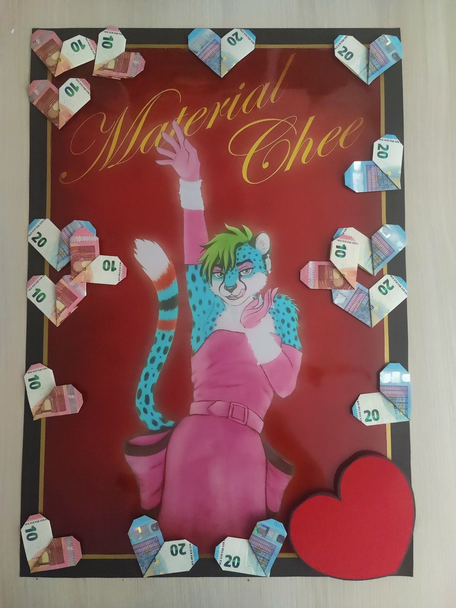 Photo of the printed poster I made, with money hearts taped on