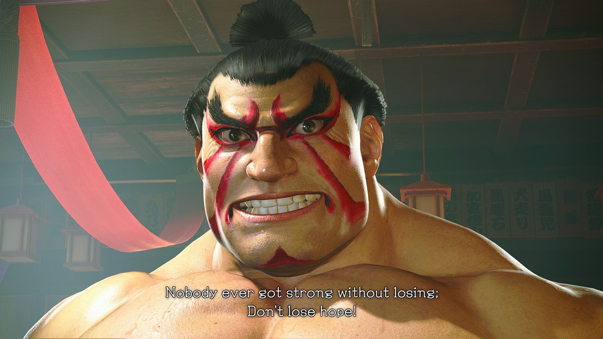 a grinning E Honda from Street Fighter 6:
"Nobody ever got strong without losing; Don't lose hope!"