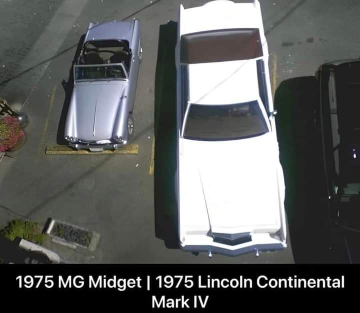 A picture of an mg midget next to a Lincoln Continental mark 4