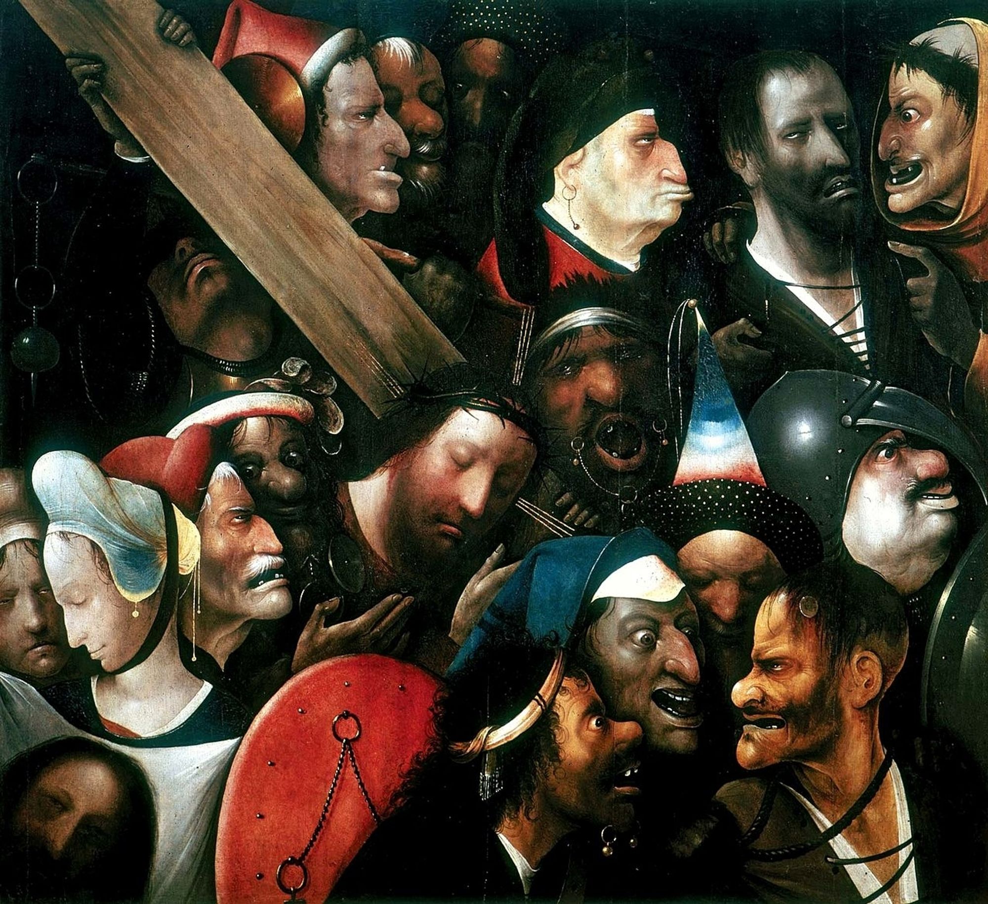 Christ carrying the cross surrounded by grotesque faces