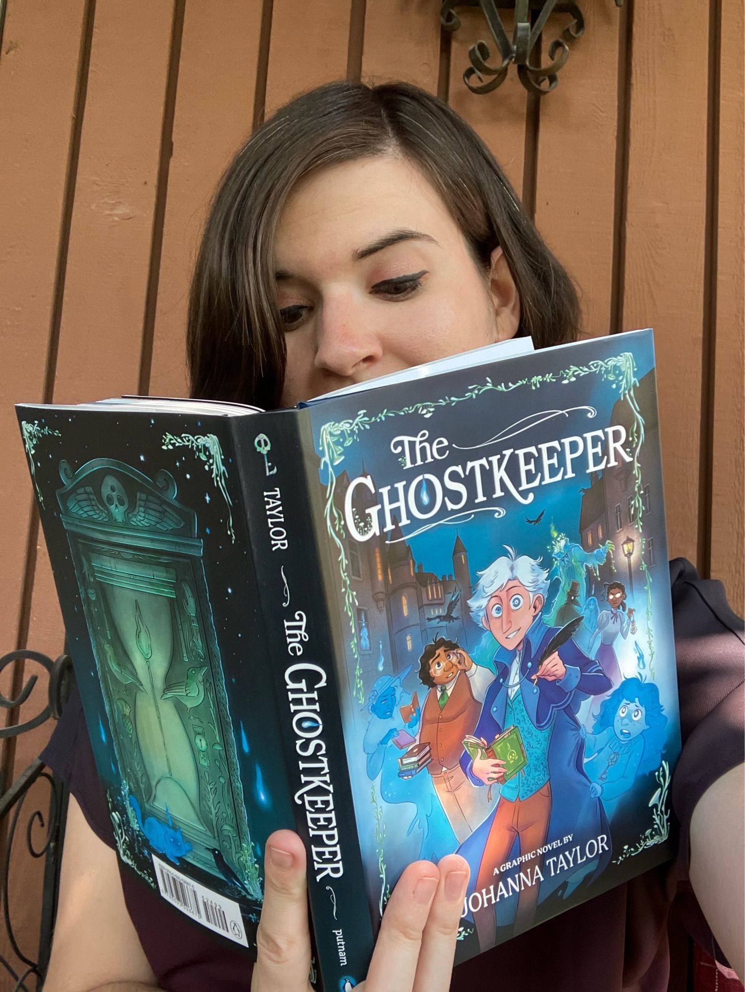 Me reading THE GHOSTKEEPER