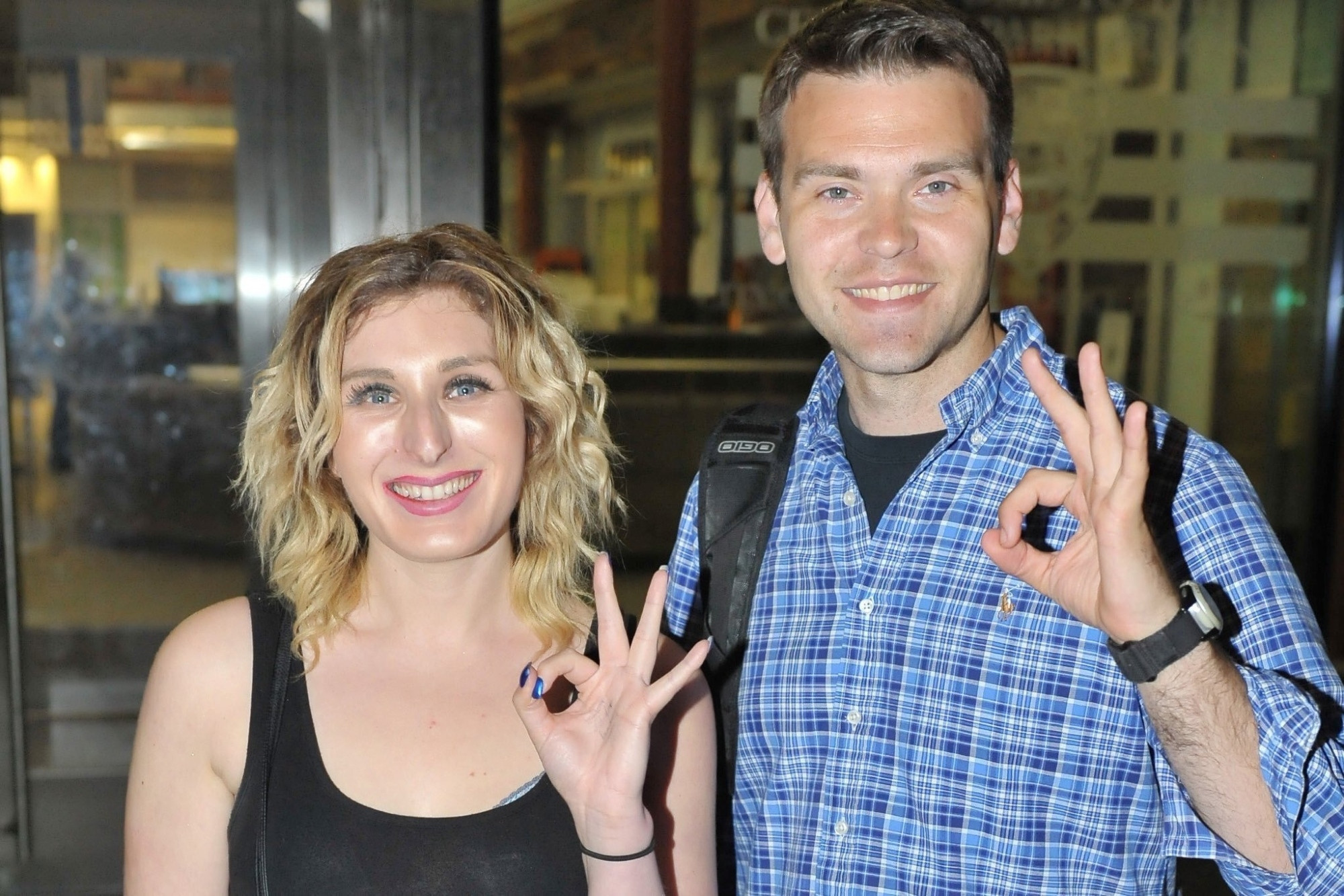 Original blond haired blue eyed Laura Loomer and Jack Posobiec doing the OK White Power symbol with big stupid grins