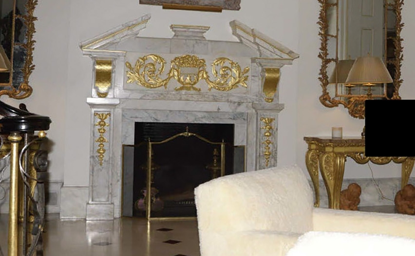 close-up of Jeffrey Epstein's ornate gilded fireplace 