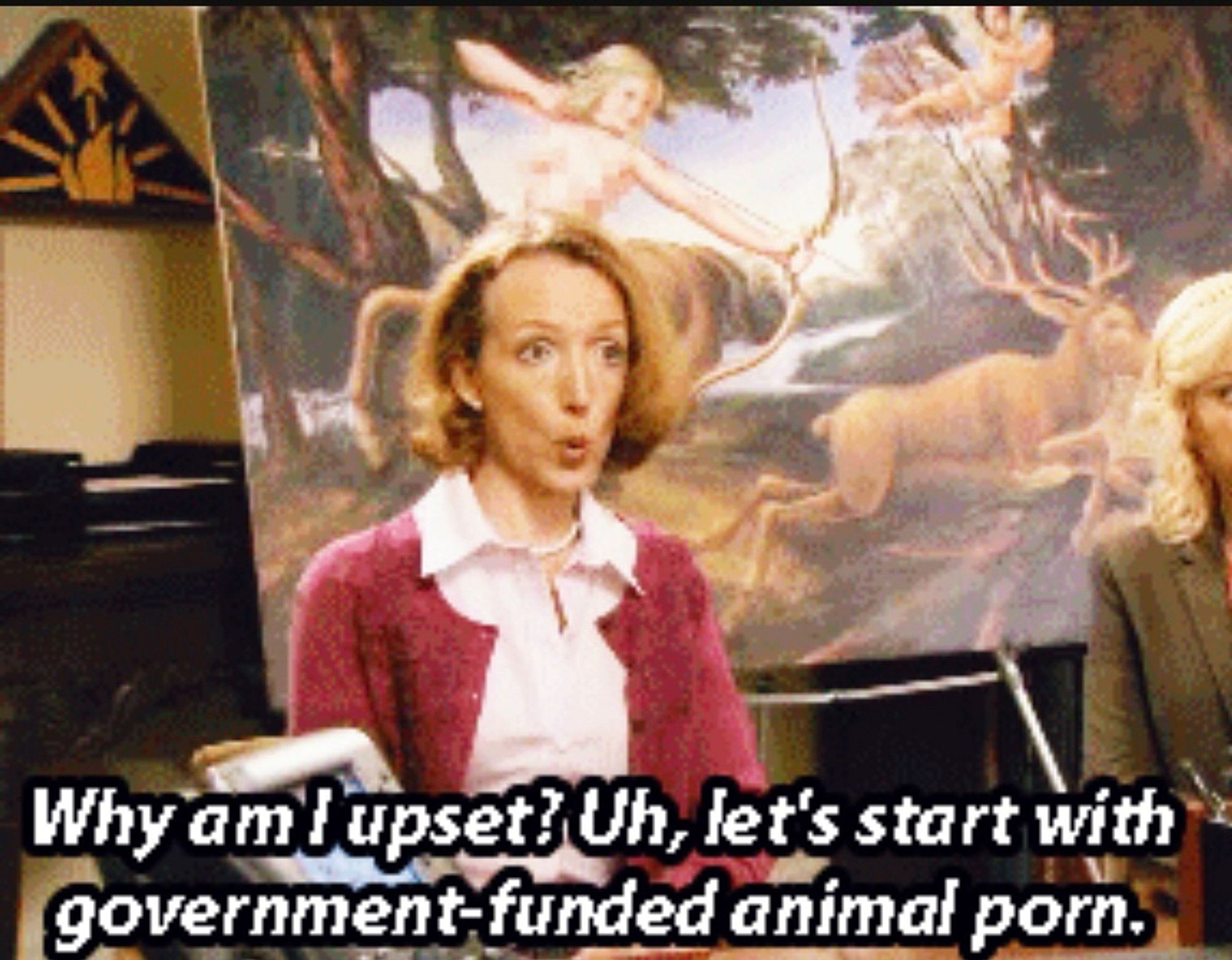 parks and recreation’s marsha langman sitting in front of a painting with a centaur and a woman’s exposed breast. it’s a greek myth. she’s appalled and says,  “Why am lupset? Uh, let's start with government-funded animal porn.”