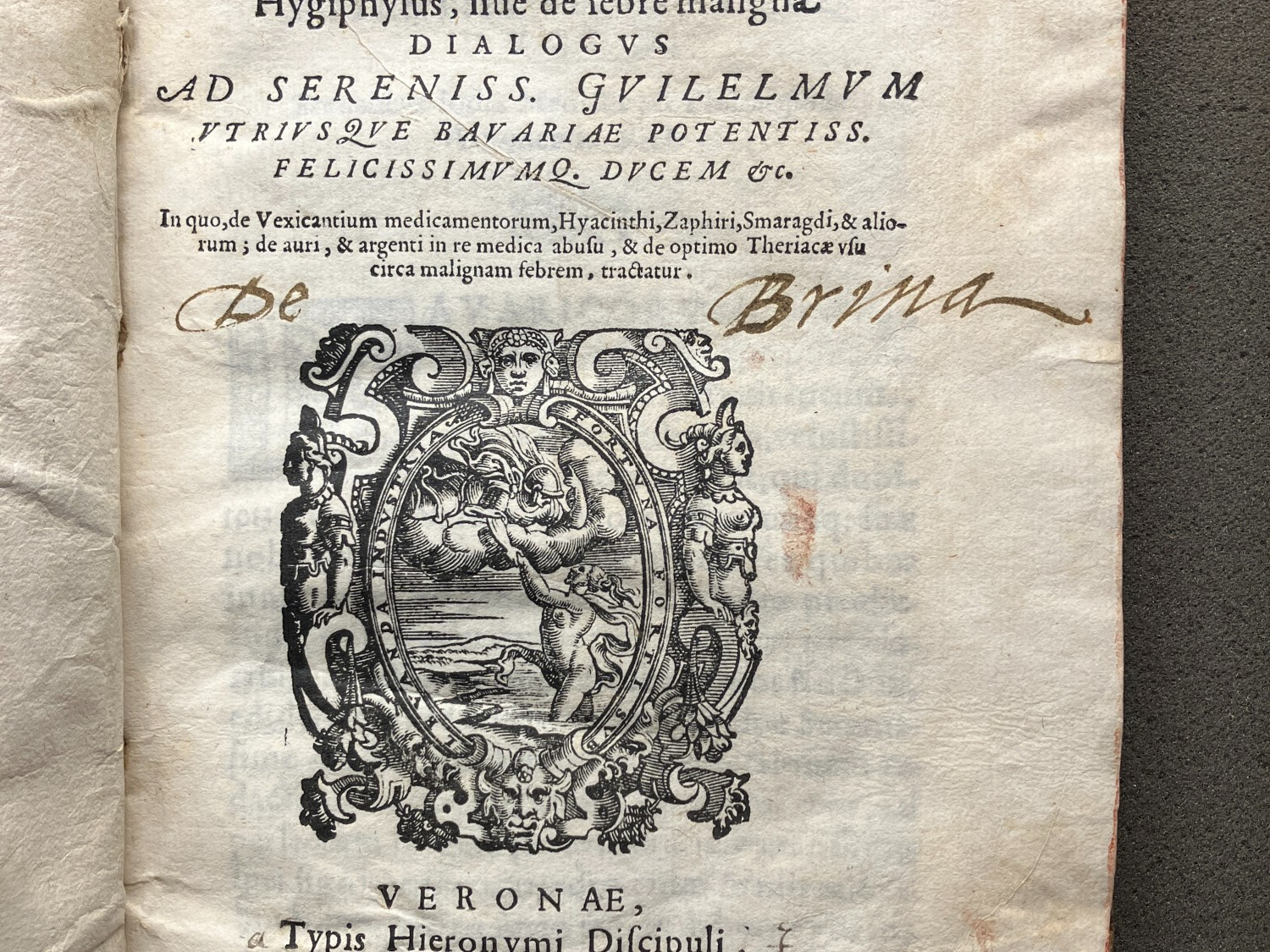 Photograph detail of title page of an early printed book, on which is written "De Brina".