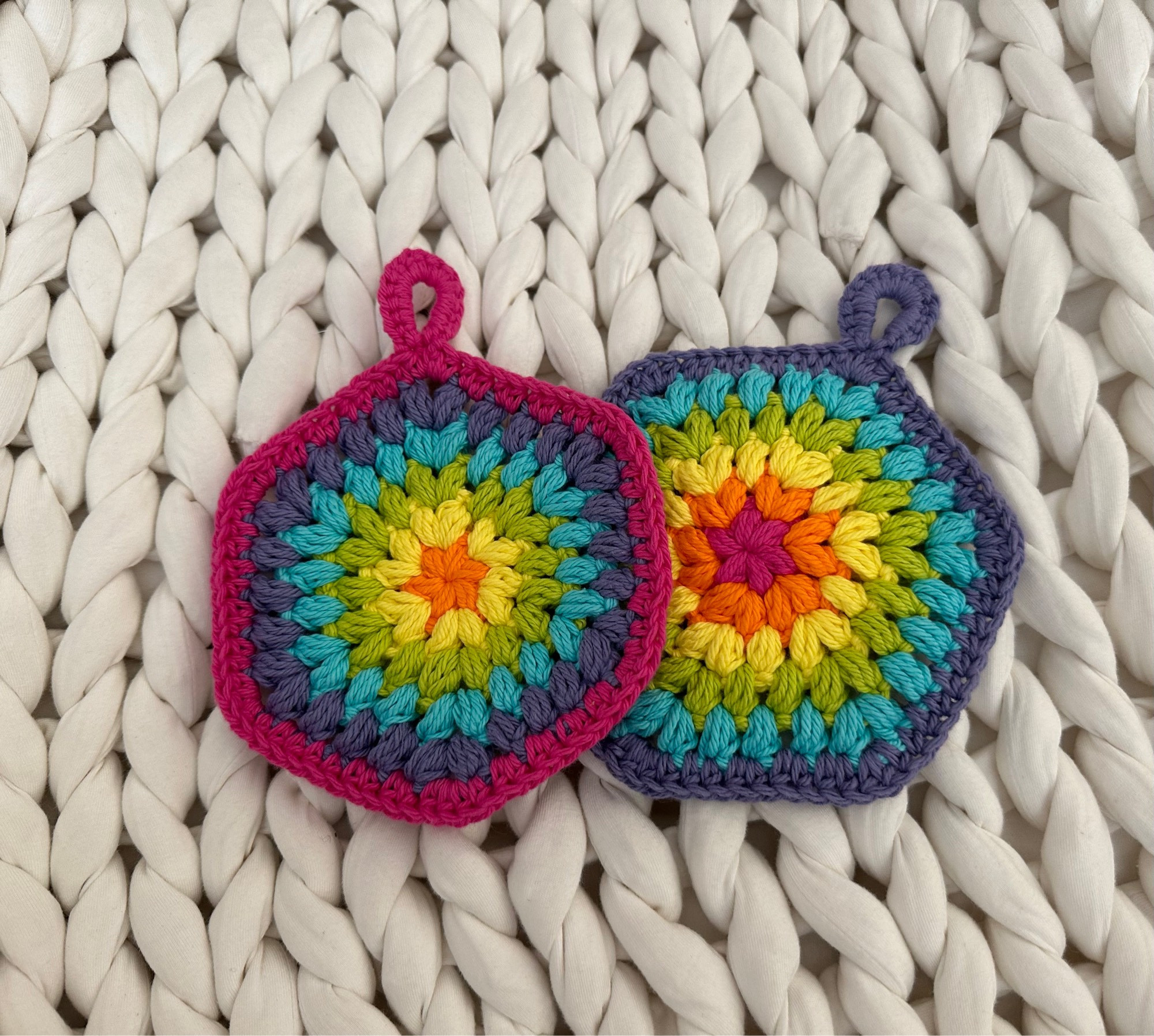 Rainbow crocheted cotton coaster/trivets. 