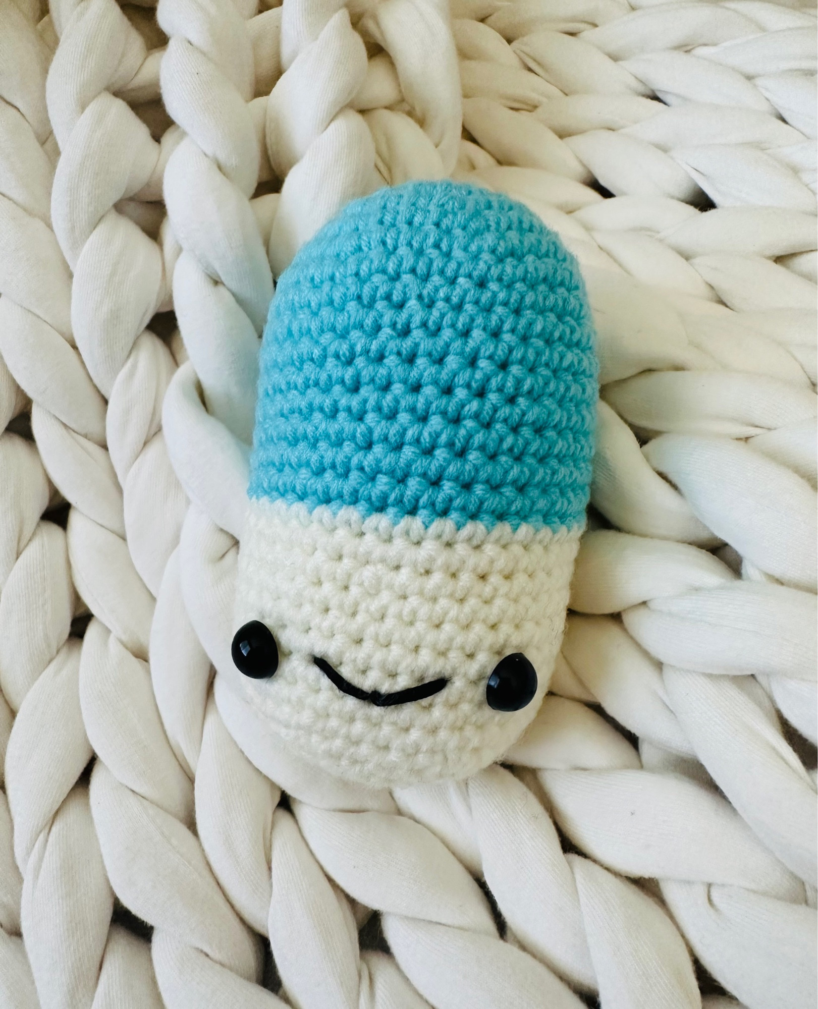 Crochet chill pill with smiley face. 