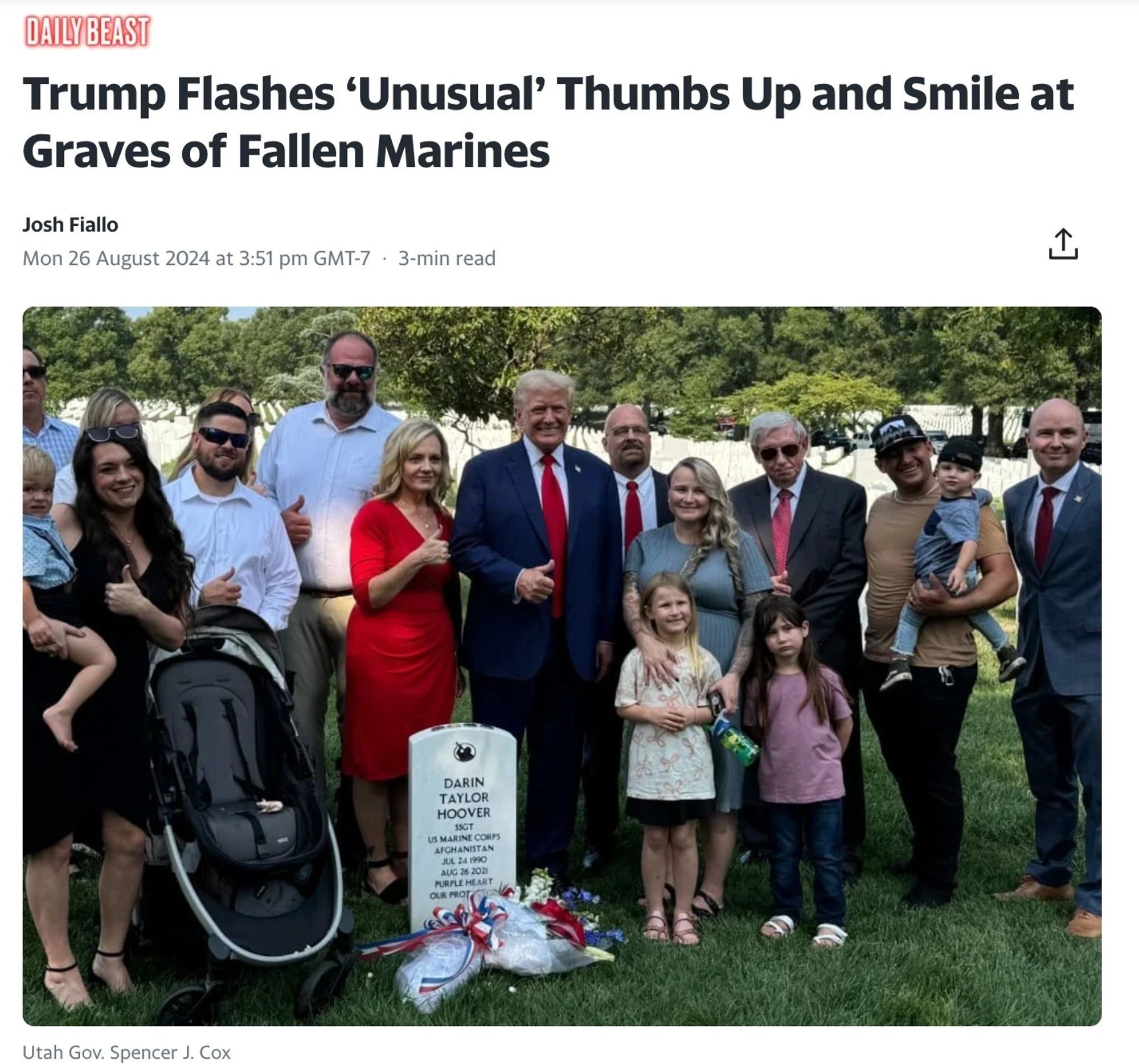 Trump giving a thumbs up at the grave of a Marine