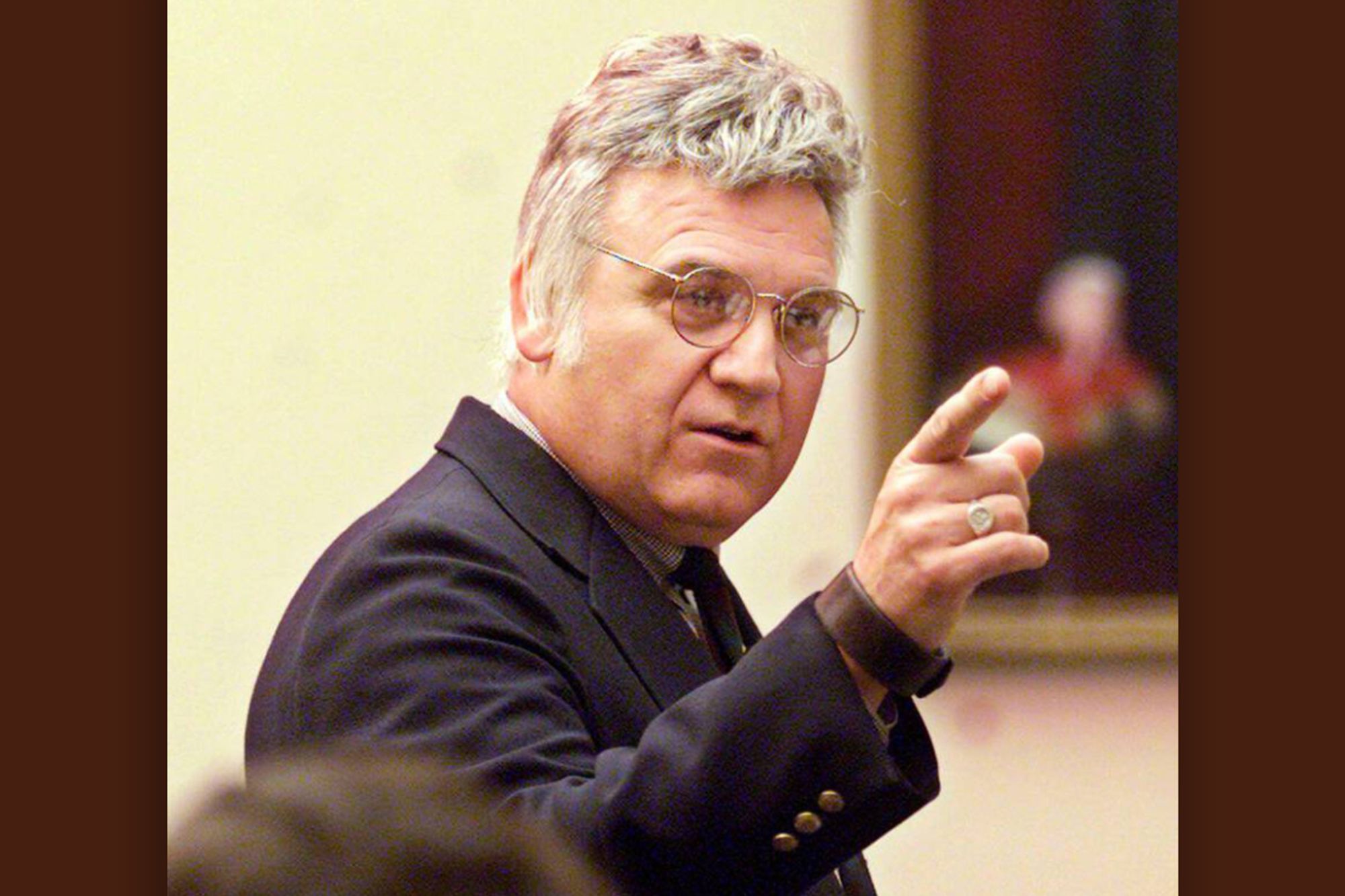 Ohio congressman James Traficant, hair towering, tinted glasses firmly in place, gaudy diamond ring and giant watchband resplendent, jabs his finger for emphasis