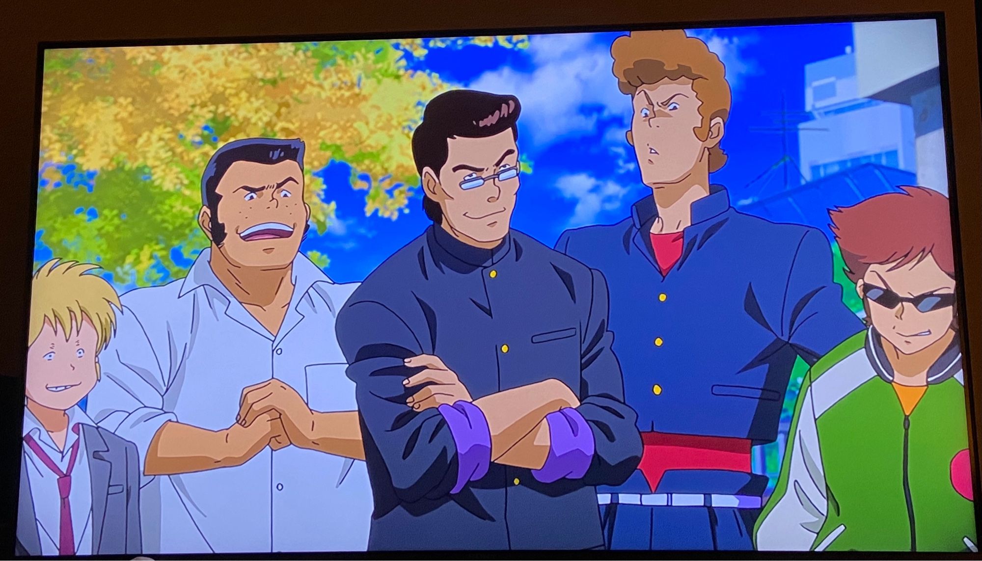 Still from the anime Yashahime, which is a sequel to older Inuyasha by the same creator of the even older Urusei Yatsura. It shows five high school boys getting ready to rumble with the protagonist. Each boy is similar to one of Lum‘s classmates