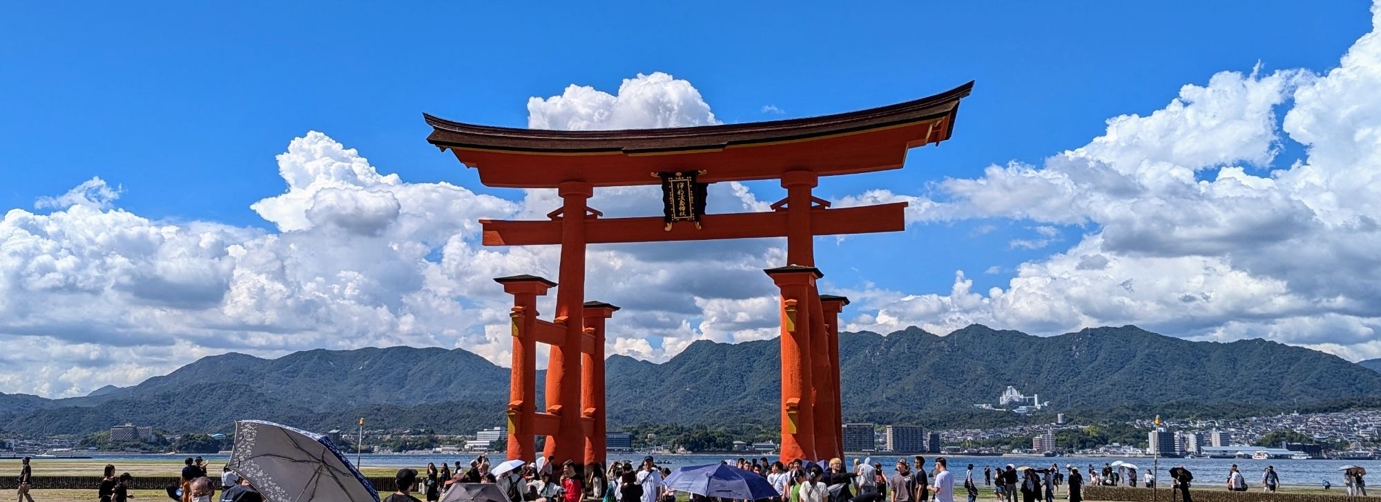 A wide view of the large, "floating" torī at Itsukushima Shrine. It's not actually floating on the water, but is instead called floating" because it's set on the sea floor instead of having buried footers.