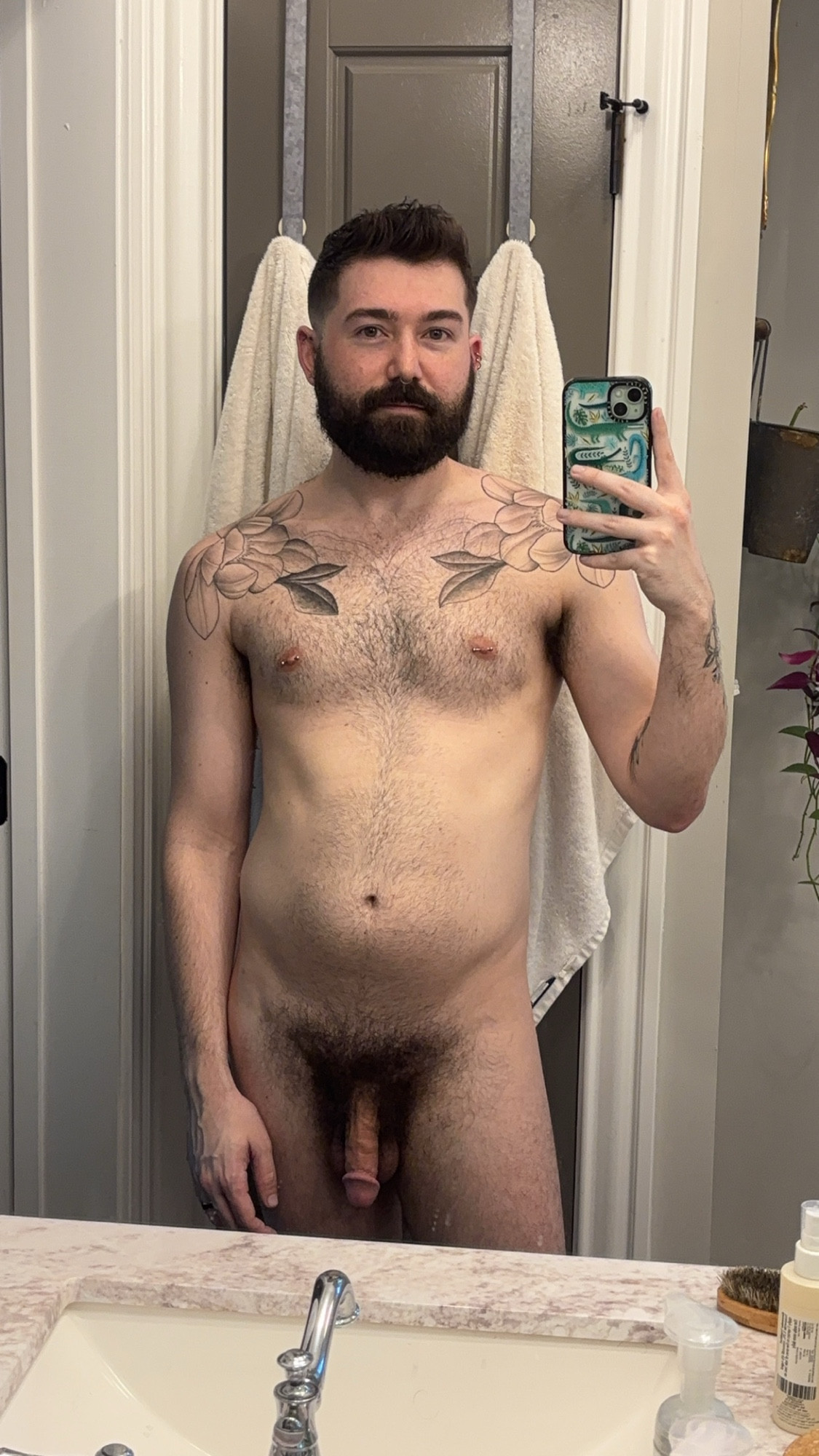 Naked mirror selfie of me showing off my pierced nipples and big hairy bush