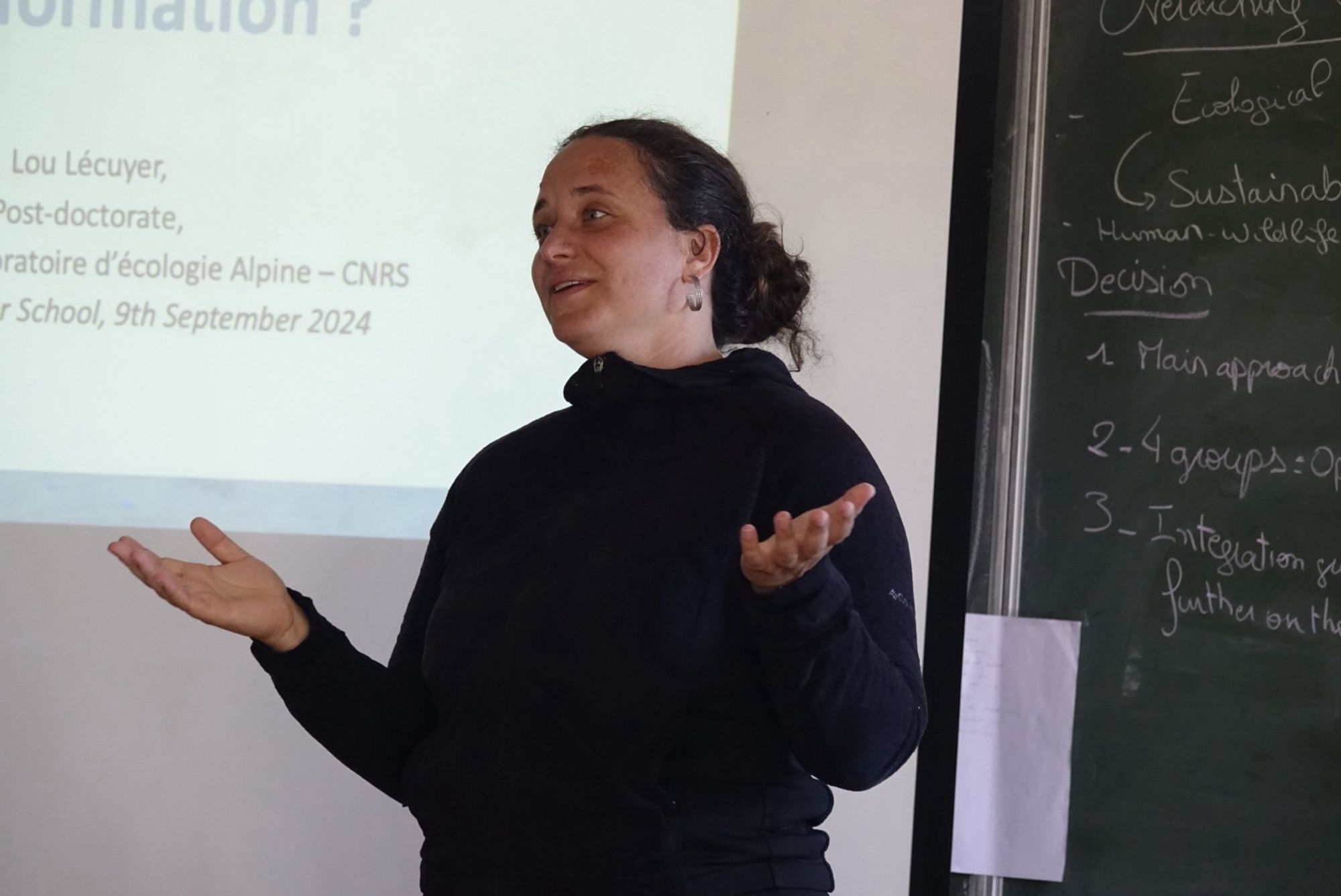 Lou Lécuyer speaking in the lecture theatre in Peyresq