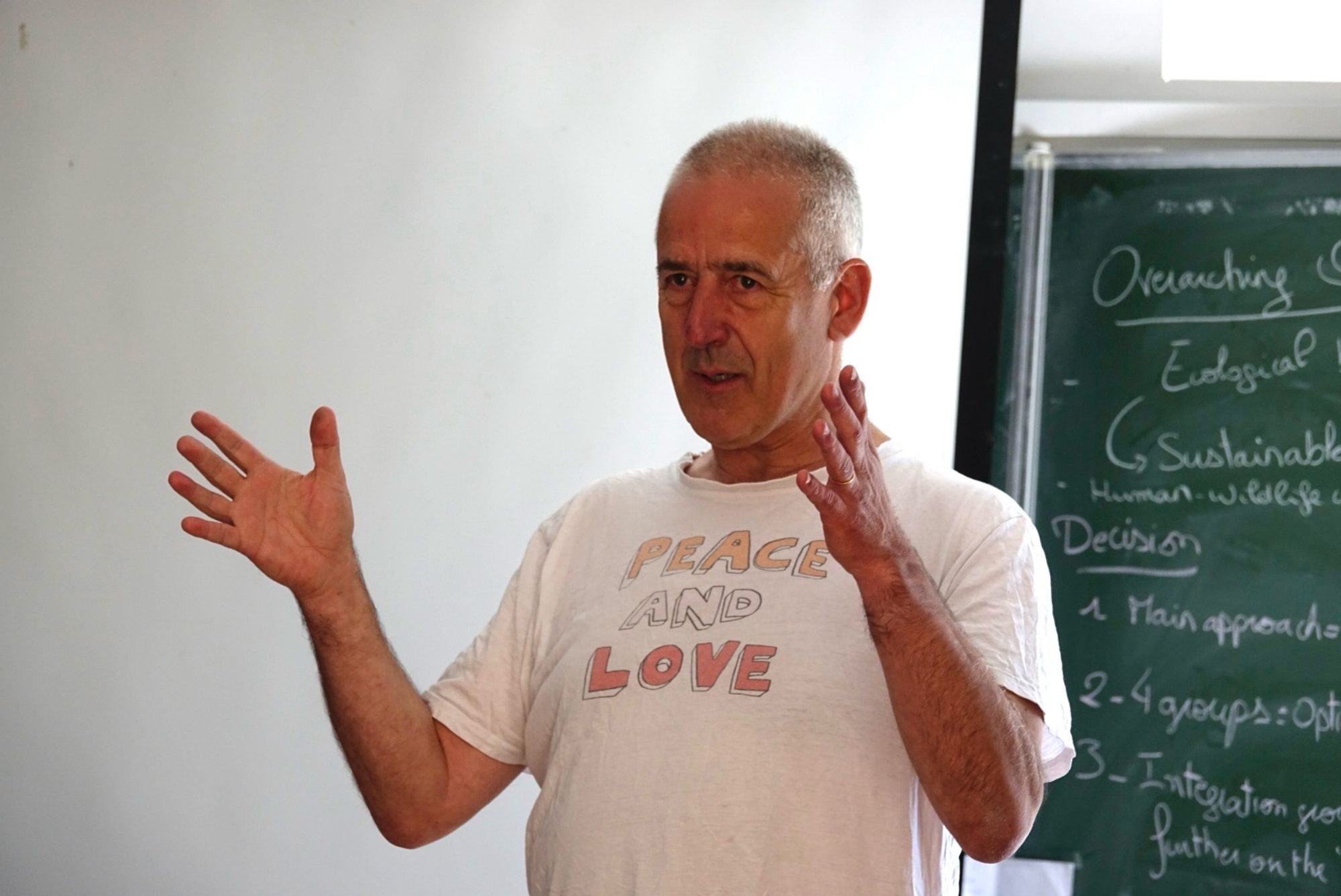 Steve Redpath speaking in the lecture theatre in Peyresq