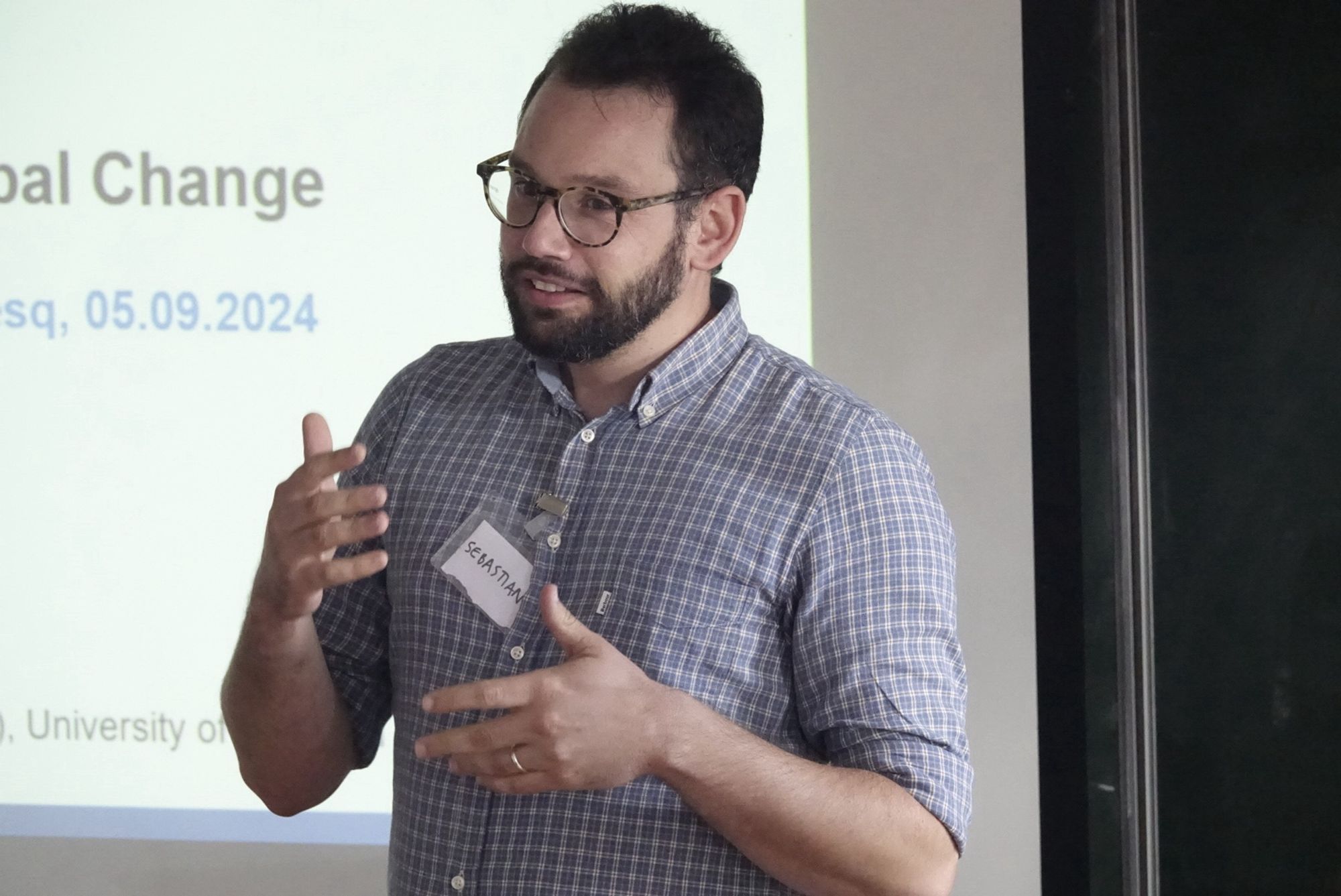 Sebastian Candiago speaking in the lecture theatre in Peyresq