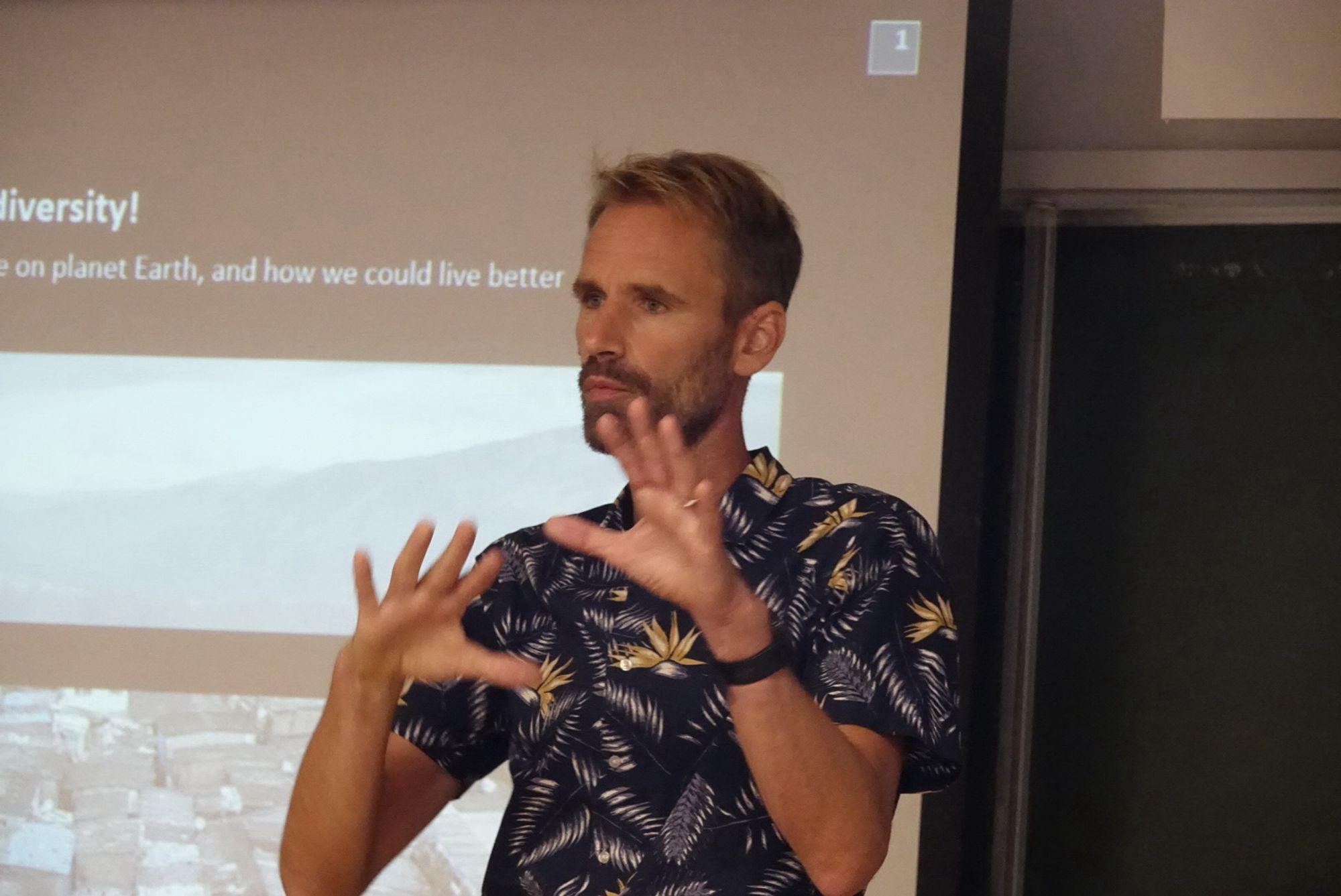 Nicolas Dendoncker speaking in the lecture theatre in Peyresq