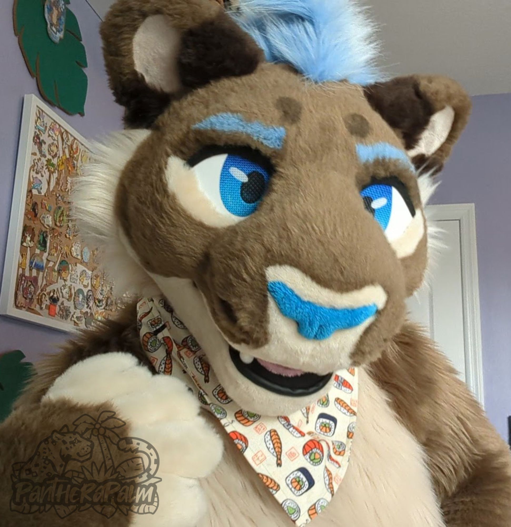 Lioness fursuiter wearing sushi print bandana