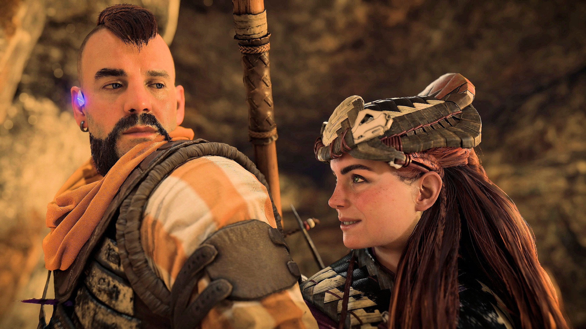 Erend and Aloy from the First Forge mission in Horizon Forbidden West. They are pictured quite close to each other and Aloy's smile reminded me of a wonderful song from Moulin Rouge, that I can't get out of my head. You'd think that people would have had enough of silly love songs...