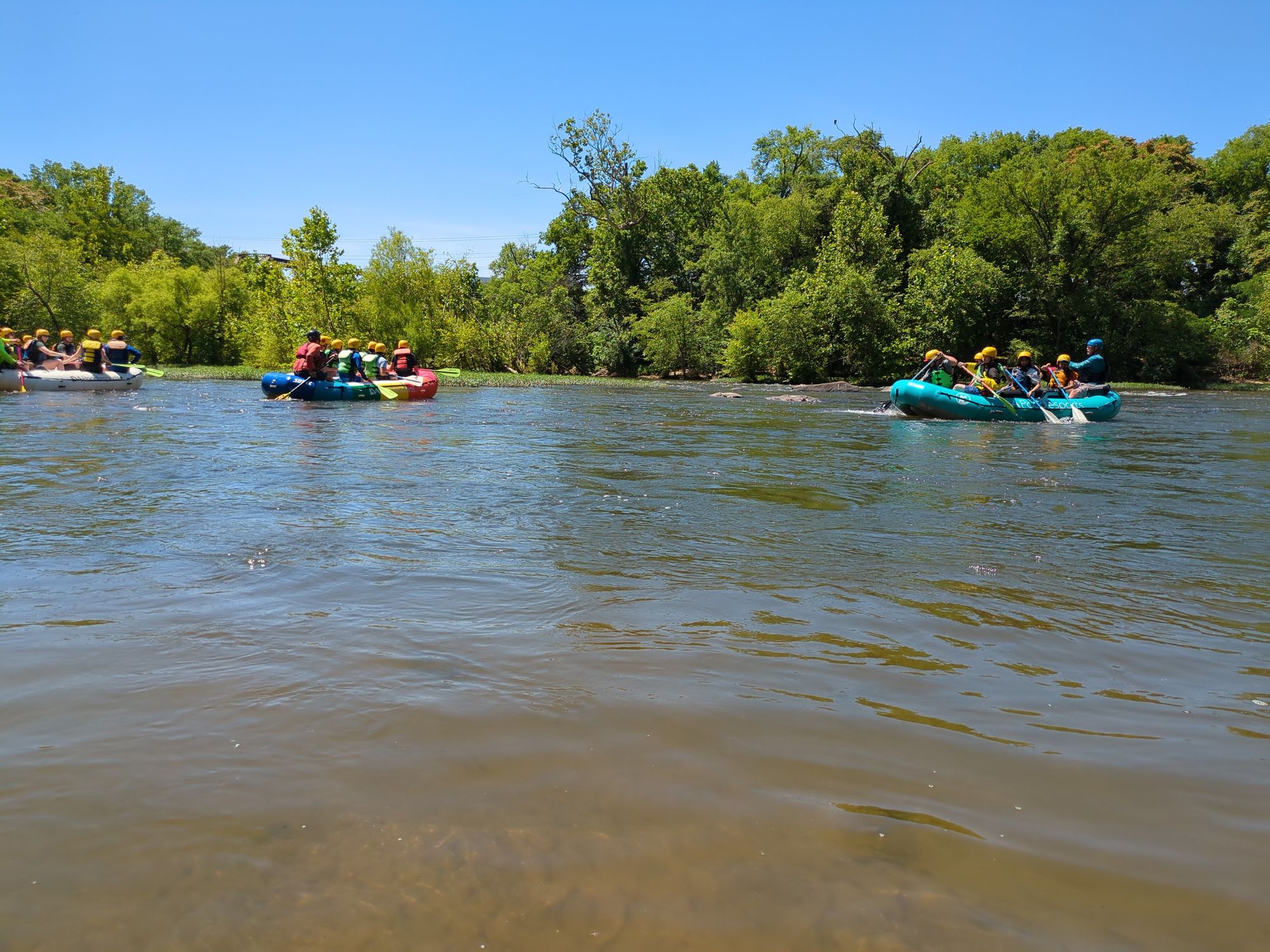 White water rafters coming down the James River. 