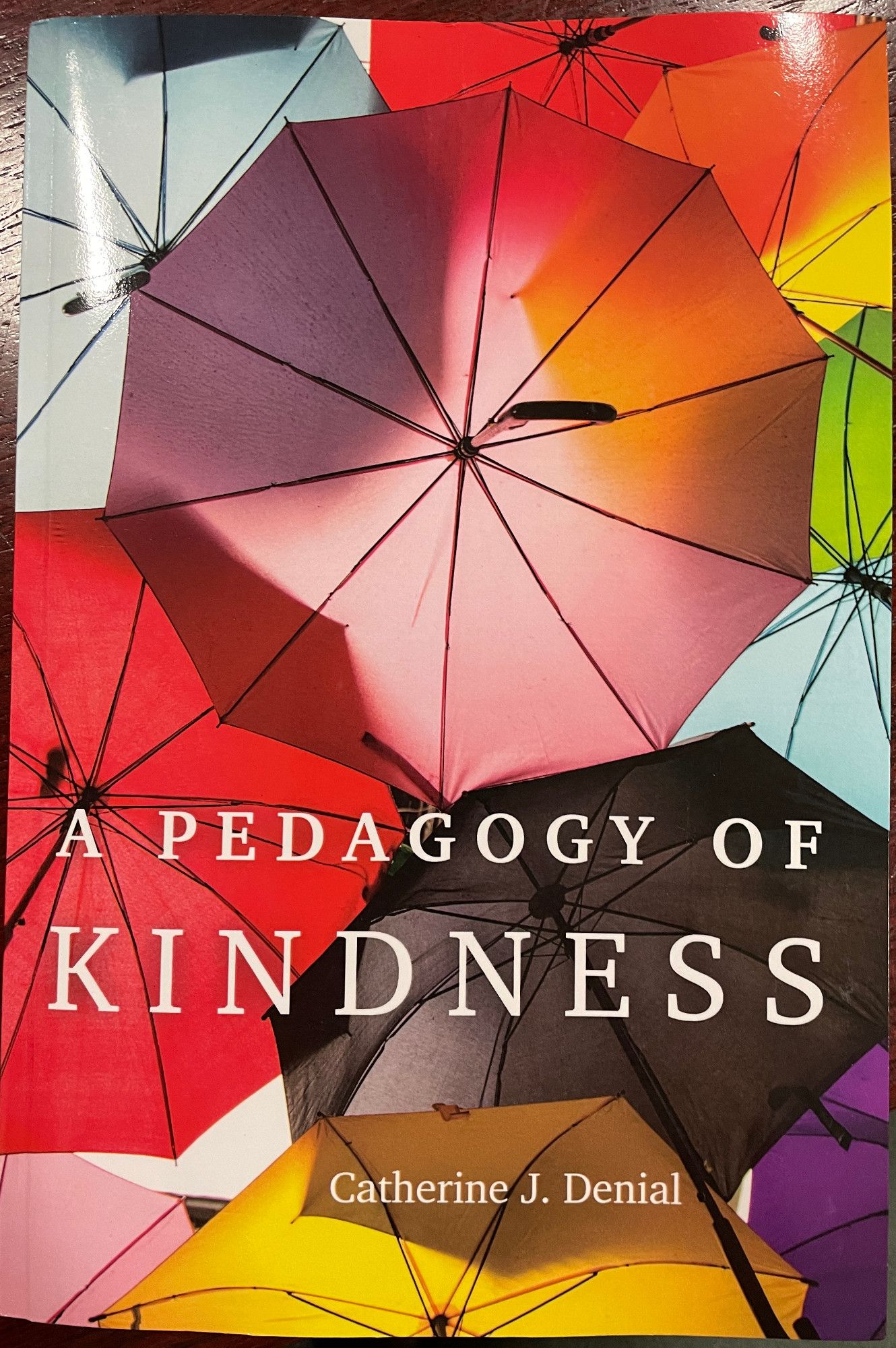 Photo of cover of Cate Denial's "A Pedagogy of Kindness"