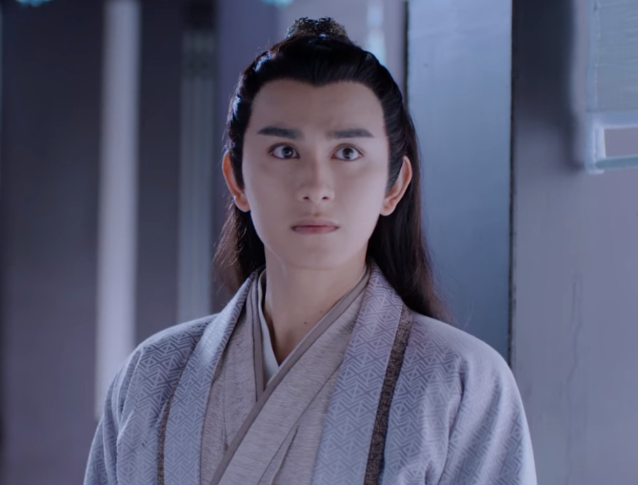 Close up on Meng Yao during the visit to the Cloud Recesses as an escort for teen Nie Huaisang, shown from mid-chest and up, an uncertain look on his face.