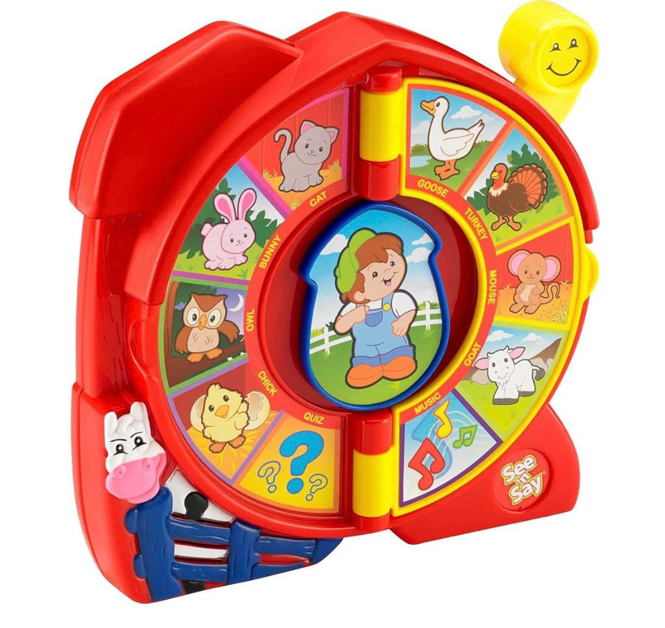 Fisher Price See N Say, a ring of several animals with a spinning arrow in the middle