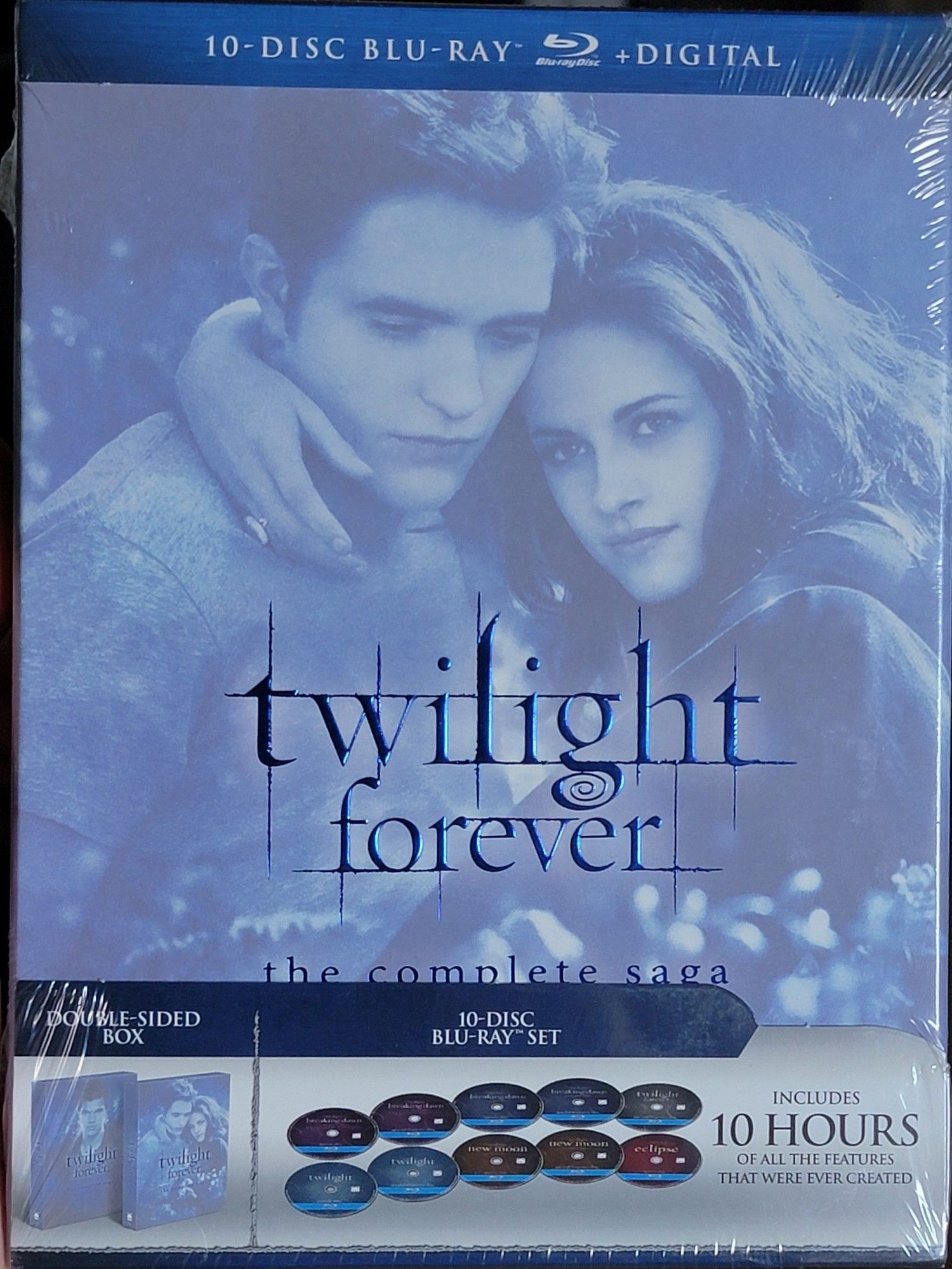 Twilight Forever box set, a box set of all Twilight movies plus ten hours of bonus content. The box is a blue filtered image of Bella and Edward holding each other.