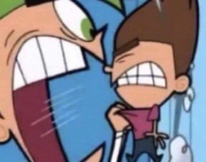 Close-up of a scene from The Fairly OddParents, of Cosmo holding Timmy Turner by the scruff of his shirt and close to his face. Cosmo is yelling, his mouth cartoonishly huge, and Timmy Turner is gritting his teeth with his eyes closed.