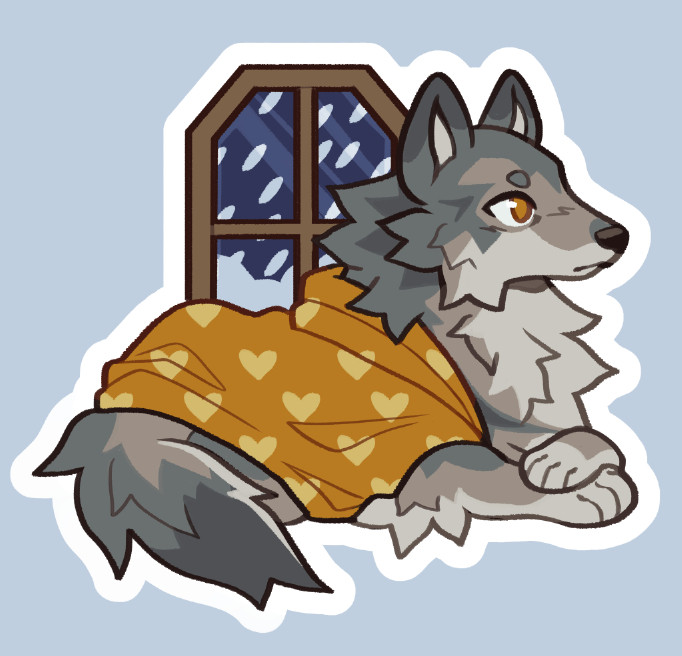 A cute sticker design of a grey wolf snuggled up inside a yellow blanket. A window in the background show it's heavily snowing outside.