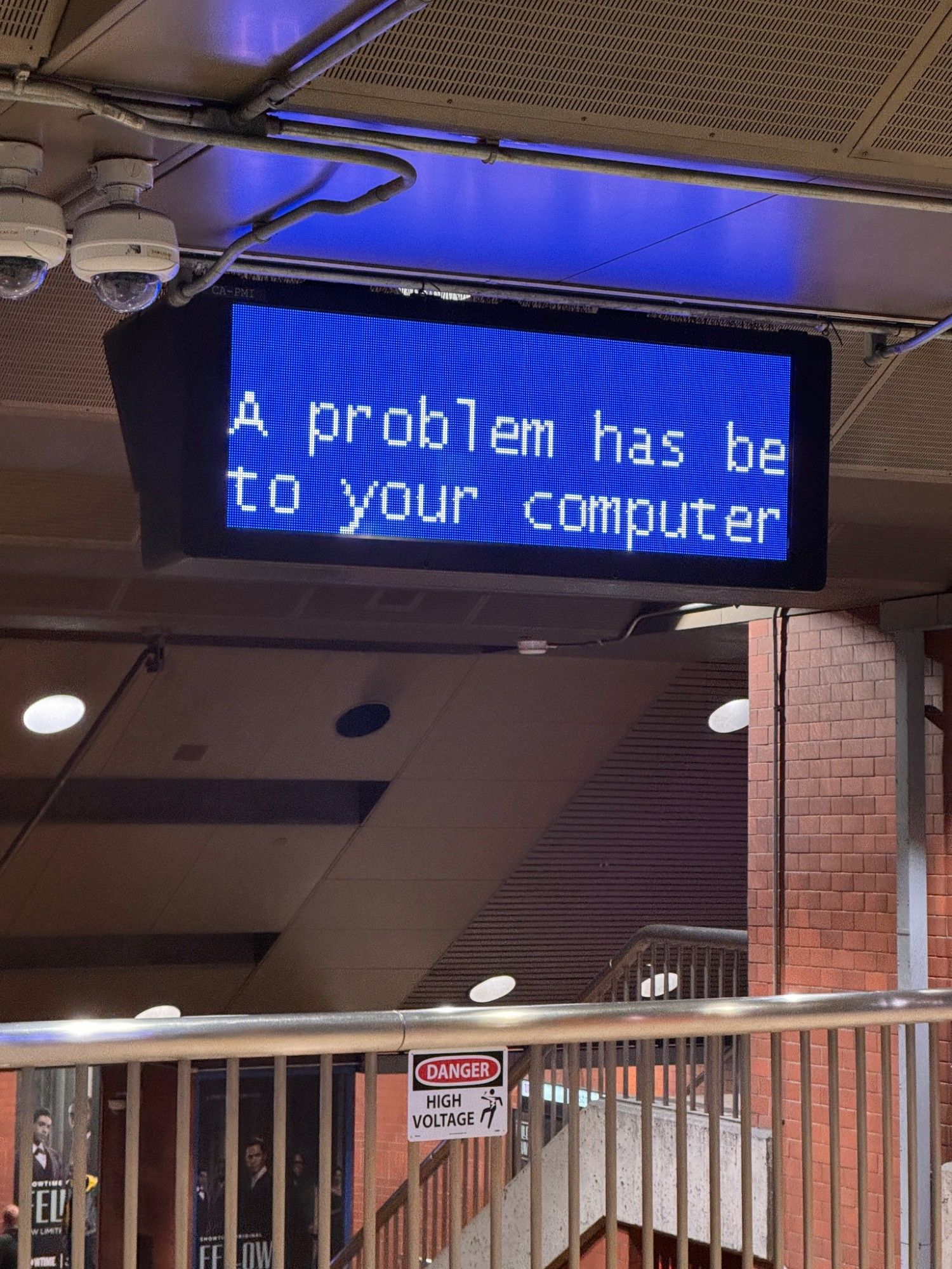 Screen hanging off ceiling

text:
A problem has be to 
your computer