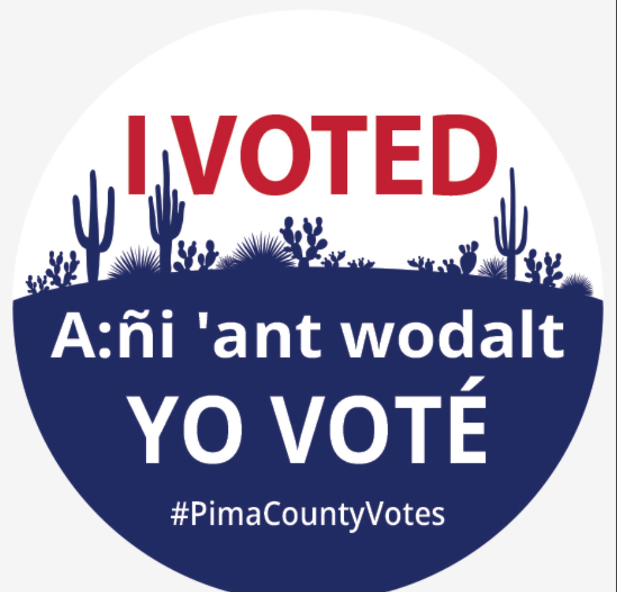 The sticker reads “I voted” in English, “A:ñi ‘ant wodalt” in Tohono O’odham and “Yo Voté” in Spanish. Most Pima County voters will be unfamiliar with the Tohono O’odham language. It was included to acknowledge that Pima County’s boundaries sit within the ancestral homelands of the Tohono O’odham Nation. Nearly 42% of Pima County’s land mass is designated as Tribal Lands and includes the Tohono O’odham Nation and the Pascua Yaqui Tribe.