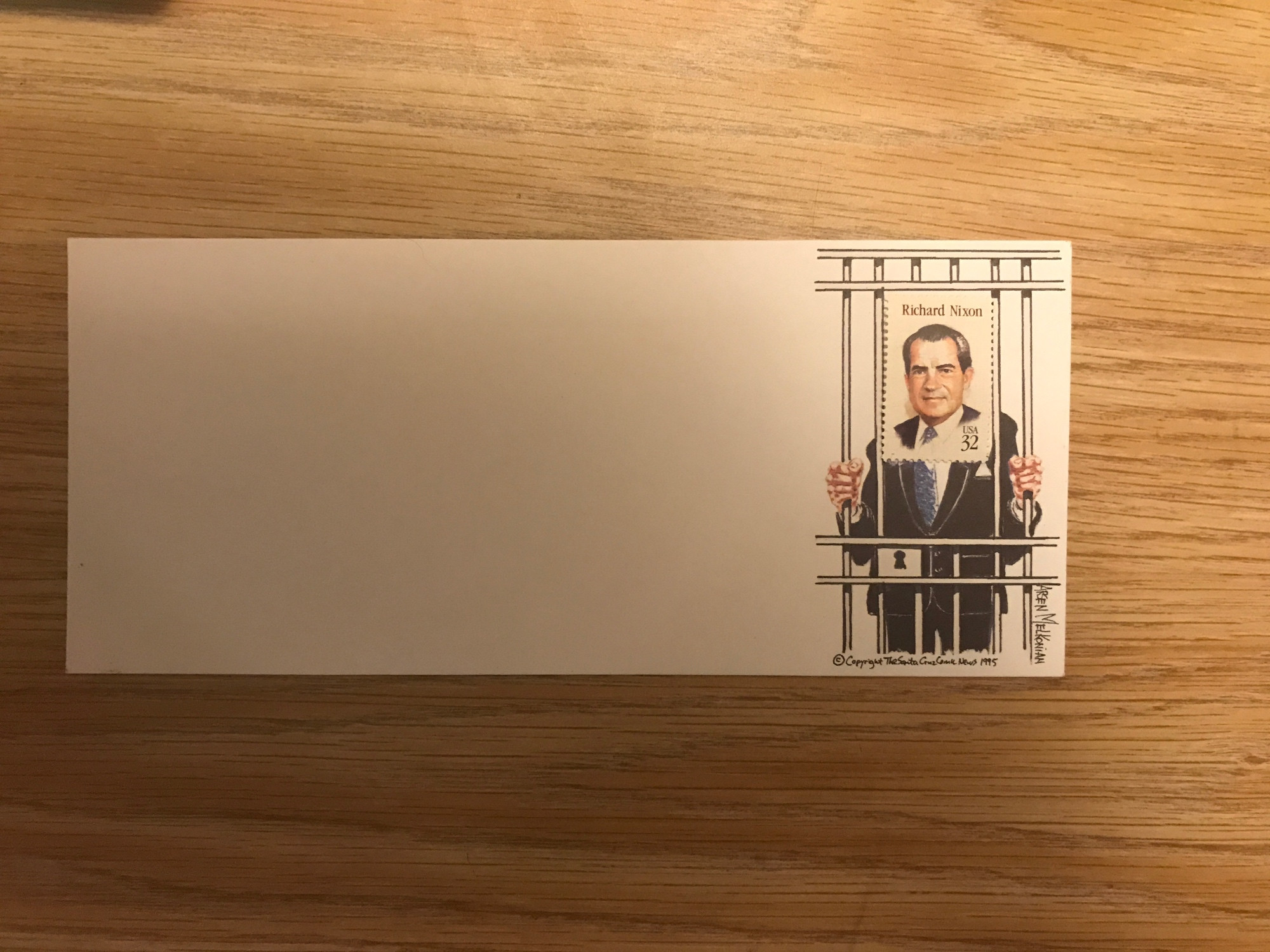 An envelope with Nixon in a jail cell with the Nixon stamp as the head