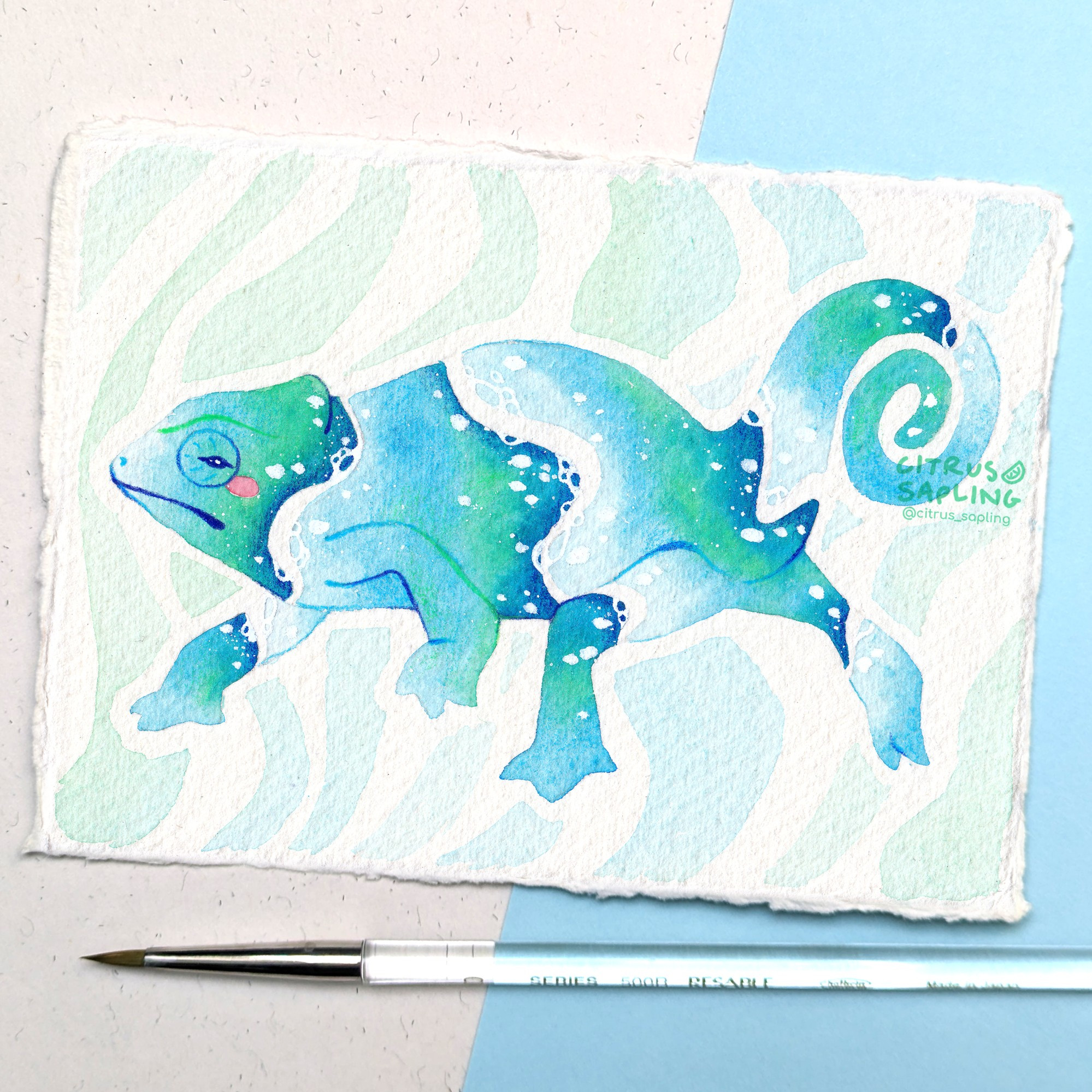 A watercolour painting of a chameleon from a side profile view. It's covered in an ocean ripple pattern with blues, greens, and white flecks. 