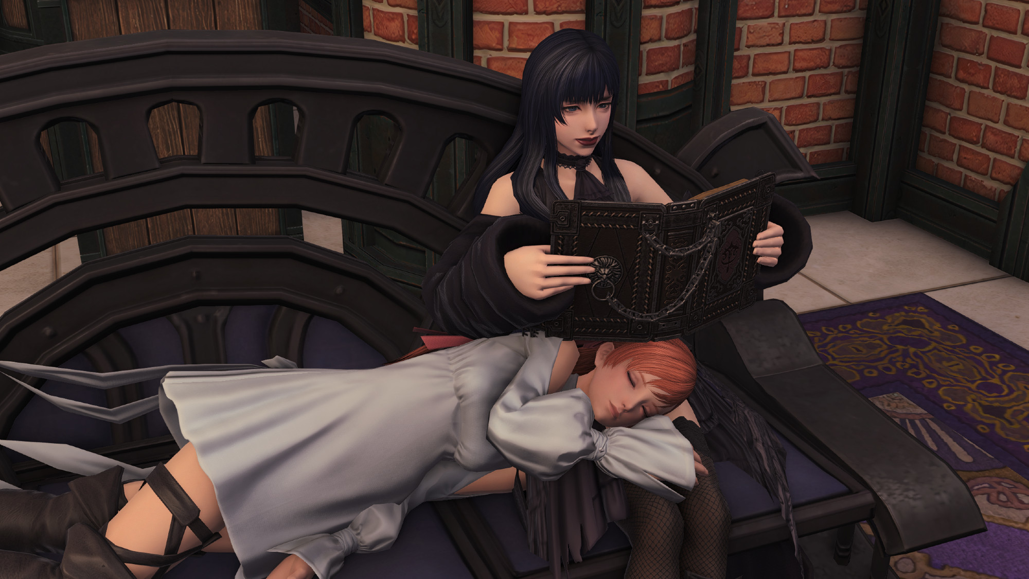 Ryne and Gaia on a couch, Ryne asleep on Gaia's lap while Gaia reads a book.