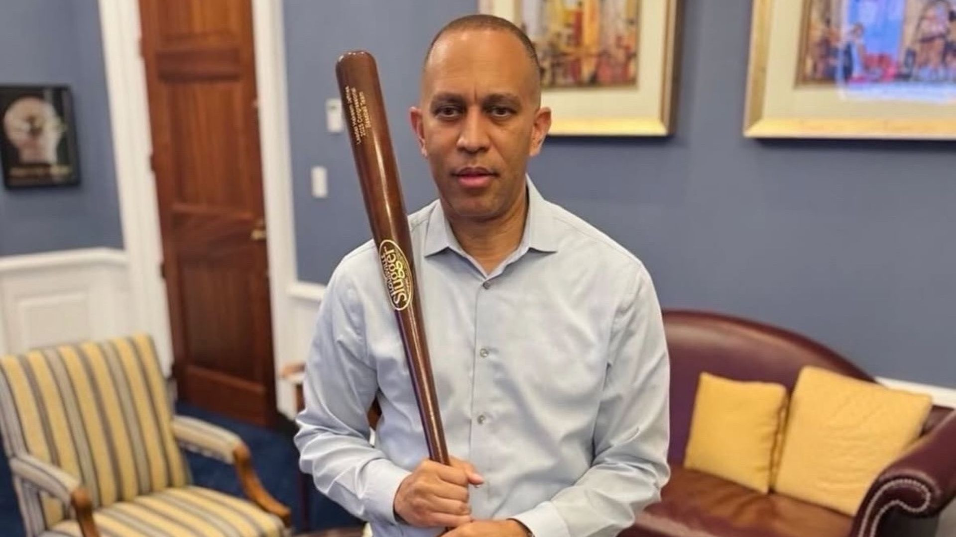 the photo op Hakim Jeffries took with him standing with a novelty Louisville Slugger bat, a reference to his 'waiting to take the swing" bullshit as an excuse for his inaction