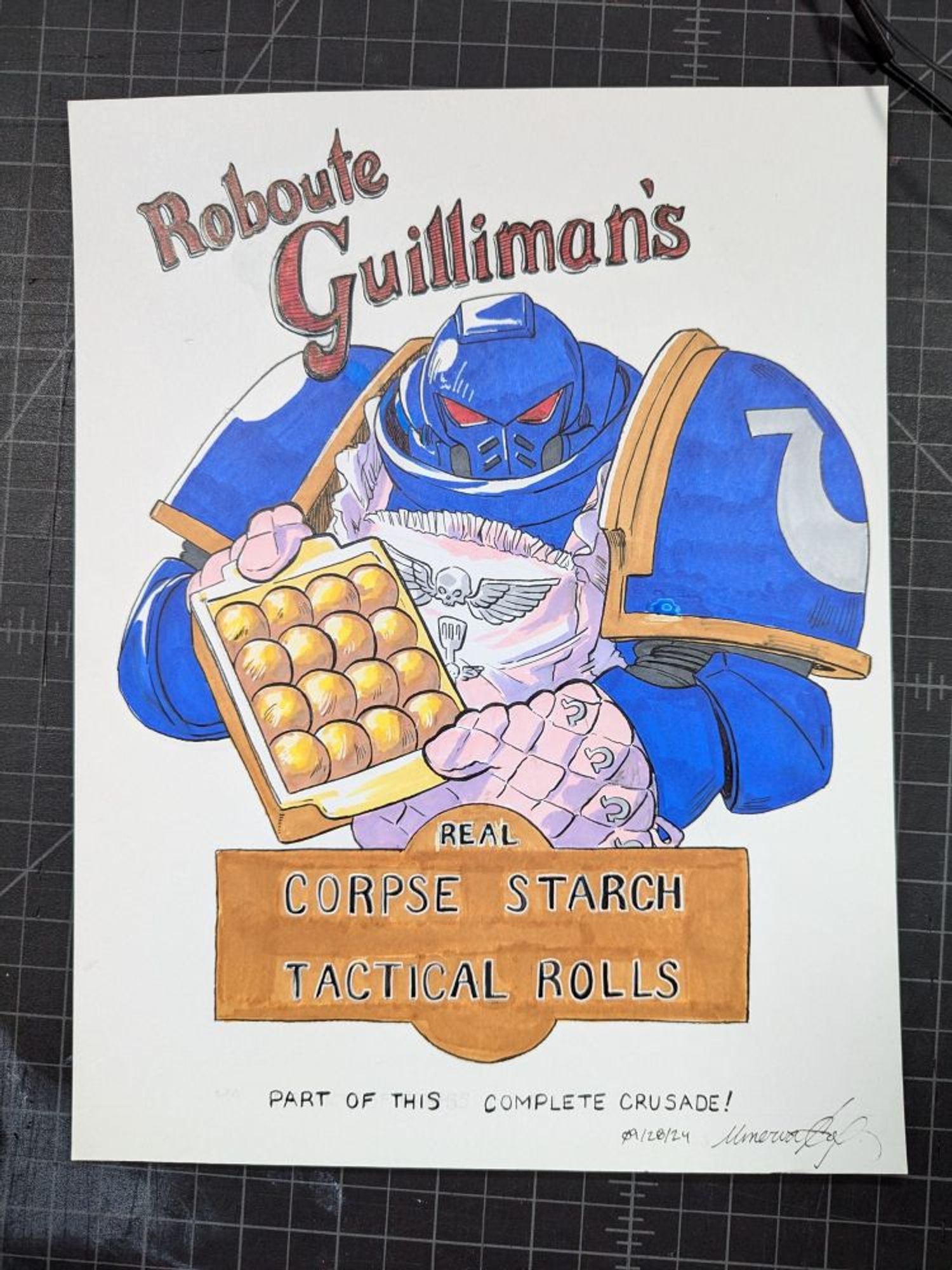 An Ultramarine is proudly displaying his freshly baked Corpse Starch Tactical Rolls