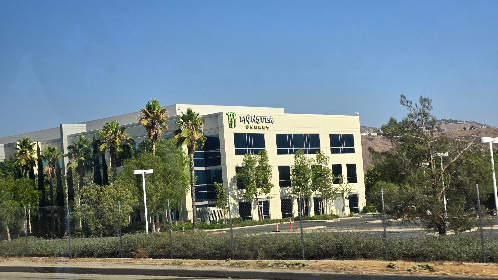 Office with a Monster Energy sign on the upper left